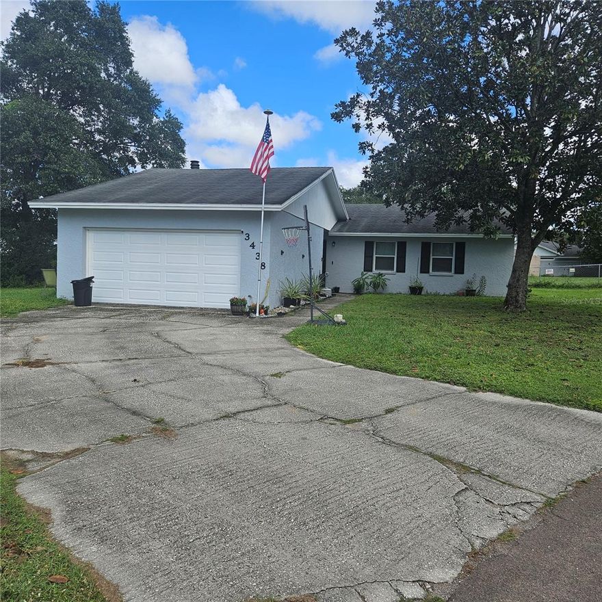 Welcome to this charming 3-bedroom, 2-bathroom single-family home nestled in a quiet cul-de-sac in beautiful South Lakeland with No HOA. This property offers the perfect combination of comfort, privacy, and convenience. Step inside to find a bright open kitchen ideal for family gathering and  entertaining. The kitchen is fully equipped next to the sliding door which opens to an enclosed porch which can be used as a play area, relaxation or gardening or pets to relax. The enclosed porch provides access to the large fenced backyard. This space is  perfect for outdoor gatherings, pets, or simply relaxing in your own private oasis it also has a shed. The bedrooms are off to one side for close family connection. Enjoy the convenience of a washer and dryer, ample storage, and modern flooring throughout. The primary suite features a private bathroom and generous closet space. Located just minutes from shopping, dining, and top-rated schools, this home offers the peace of suburban living while keeping you close to everything.