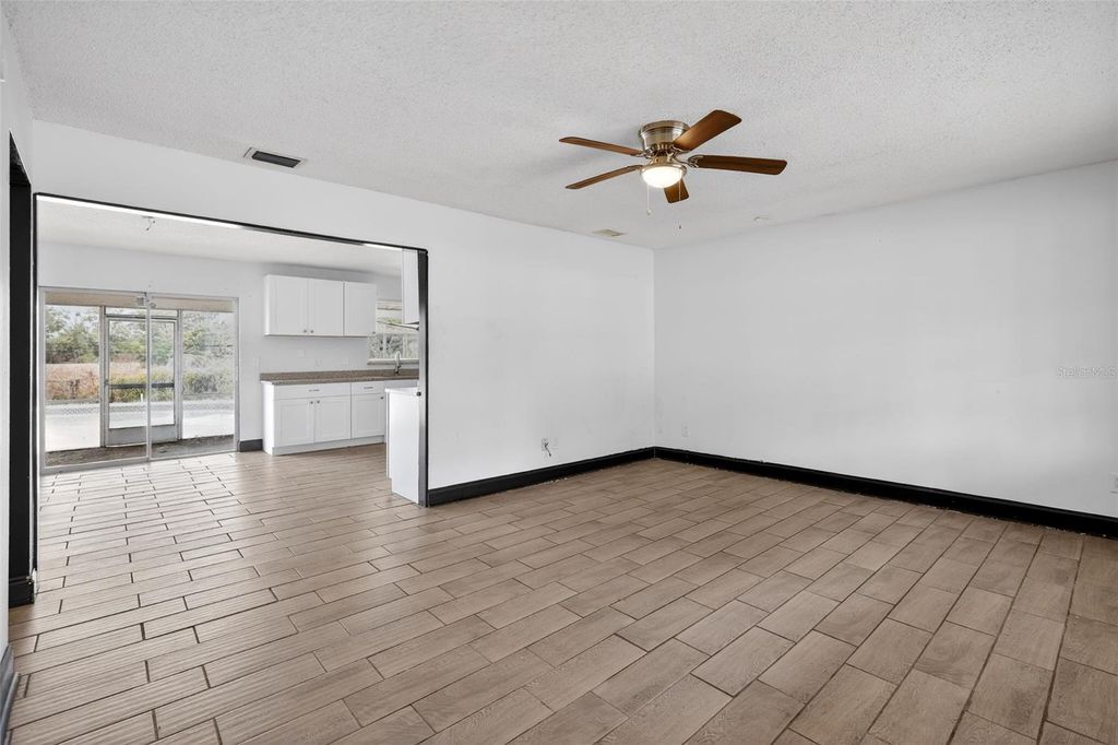 Photo of 4534 Lemans Drive, Orlando, FL 32808 (MLS # O6365376)