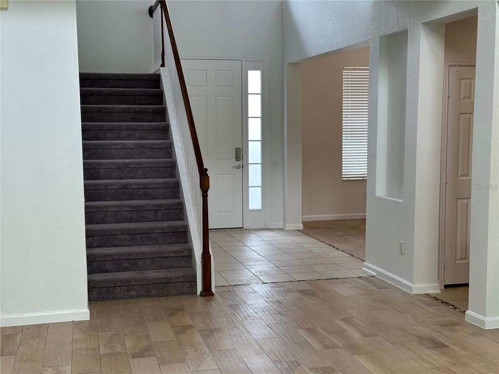 Photo of 1522 Malon Bay Drive, Orlando, FL 32828 (MLS # O6404389)