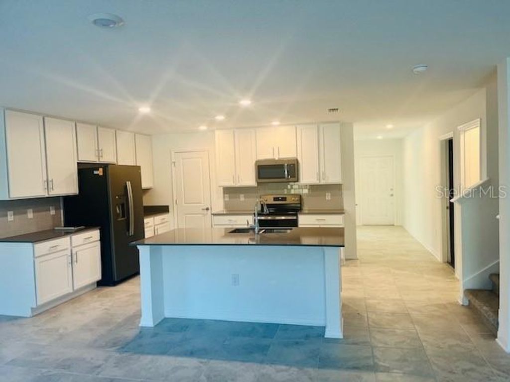 Photo of 1910 Birnham Wood Bend, Kissimmee, FL 34746 (MLS # O6364228)