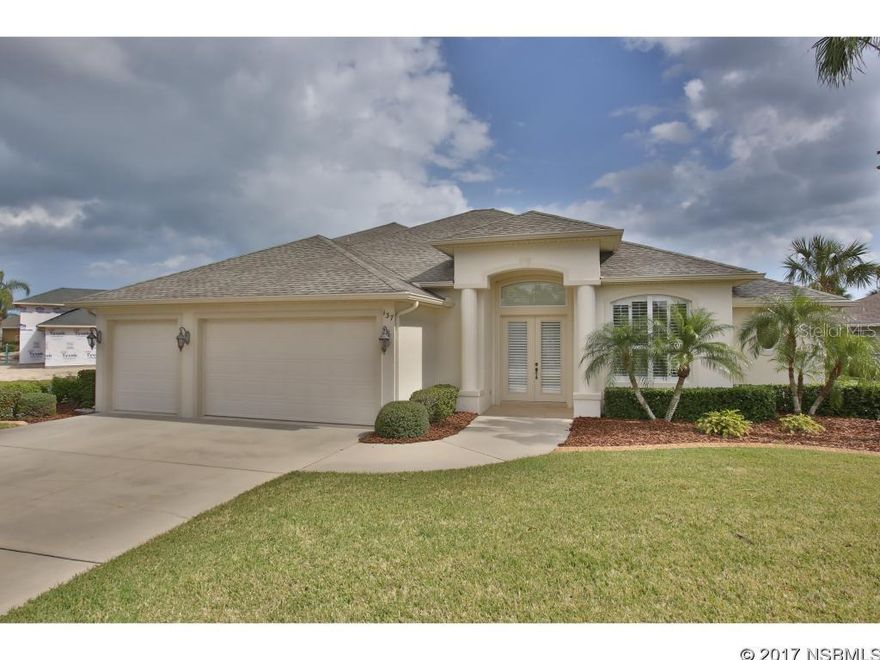 THIS BEAUTIFUL AND VERY WELL TAKEN CARE OF HOME IS READY FOR YOUR MOST DISCERNING BUYER. NESTILED IN THE PRIVATE GATED COMMUNITY OF MANGROVE ESTATES, THIS HOME WELCOMES YOU WITH A GRAND LIVING ROOM WITH BUILT IN FEATURES, VOLUME CEILINGS,AND A VERY OPEN FEEL. THE VERY UNIQUENESS OF THIS HOME IS THE DOUBLE MASTER SUITE ON THE FIRST FLOOR WHICH BOTH HAVE LARGE BATHROOMS, BEAUTIFUL VANITIES, WALK IN SHOWERS AND WALK IN CLOSETS. OUR KITCHEN FEATURES GRANITE CABINET TOPS THROUGHOUT, CUSTOM BUILT IN CABINETS AND A LARGE BREAKFAST NOOK THAT LOOKS OUT TO THE POOL. IF YOU ARE LOOKING FOR A GARAGE THAT WILL FIT 3 CARS PLUS STORAGE/WORK AREA, THIS HOME'S GOT IT!! FROM THE LIVING ROOM, YOU CAN WALK OUT TO THE LARGE LANAI  AND BE READY TO ENTERTAIN FAMILY, FRIENDS AND GUESTS WITH THIS PRISTINE ENCLOSED HEATED SALT WATER POOL. A SPARE 3RD BEDROOM UPSTAIRS IS READY FOR GUESTS AND OFFERS A LARGE BATHROOM WITH TUB AND A BALCONY PROVIDING AWESOME VIEWS OF THE POOL AND SURROUNDING AREA. OTHER SOUGHT AFTER FEATURES THIS HOME OFFERS ARE THE INSTANT HOT H2O, SPACIOUS INSIDE LAUNDRY ROOM,OFFICE/DEN ROOM, SEC SYSTEM, IRRIGATION ON WELL AND A NICE PRIVATE BACK YARD. THIS HOME STILL HAS THAT"NEW HOME FEEL"TO IT. CALL TODAY FOR YOUR PRIVATE VIEWING EASY TO SHOW! ;Water: City