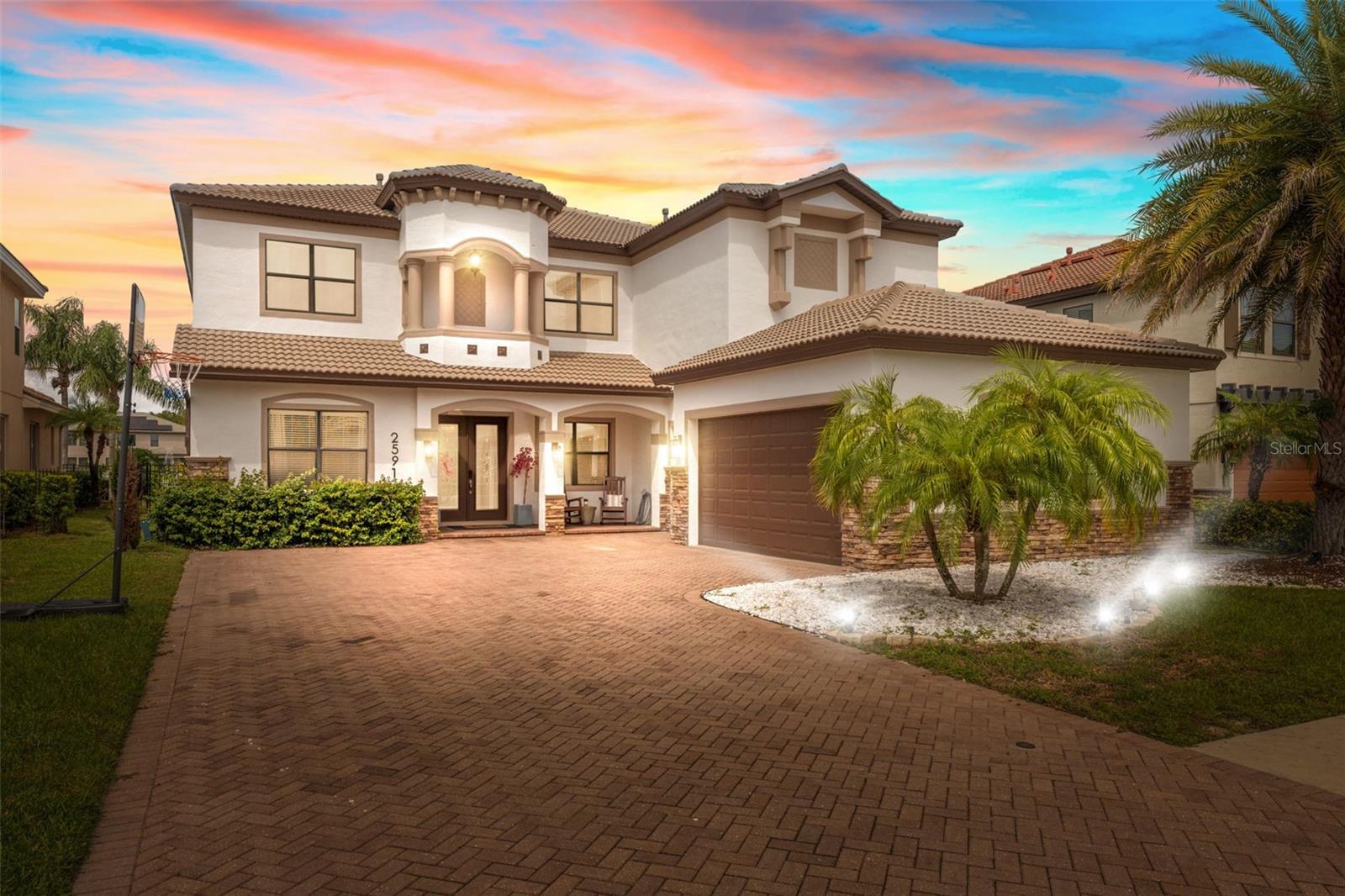 Welcome to 2591 Grand Cypress Blvd, an exceptional 5-bedroom, 3.5-bath residence located in the prestigious gated community of Grand Cypress on Lake Tarpon in Palm Harbor. This beautifully appointed home offers the perfect blend of luxury, comfort, and functionality. Step outside to your brand-new pool (2024) with tranquil water views, and entertain with ease at the outdoor kitchen. Inside, you’ll find spacious living areas with tray ceilings, an electric fireplace, and a gourmet kitchen featuring a gas cooktop. The 3-car garage provides ample storage, while the dedicated office and theater room with projector and screen make working and entertaining at home effortless. Retreat to the luxurious master suite, a true sanctuary boasting crown molding, a chandelier-lit custom walk-in closet with built-ins, and a spa-like en suite bath. Additional highlights include dreamy built-in closets throughout, and access to the community boat ramp for endless adventures on Lake Tarpon. This is more than a home—it’s a lifestyle. Don’t miss the opportunity to make it yours!