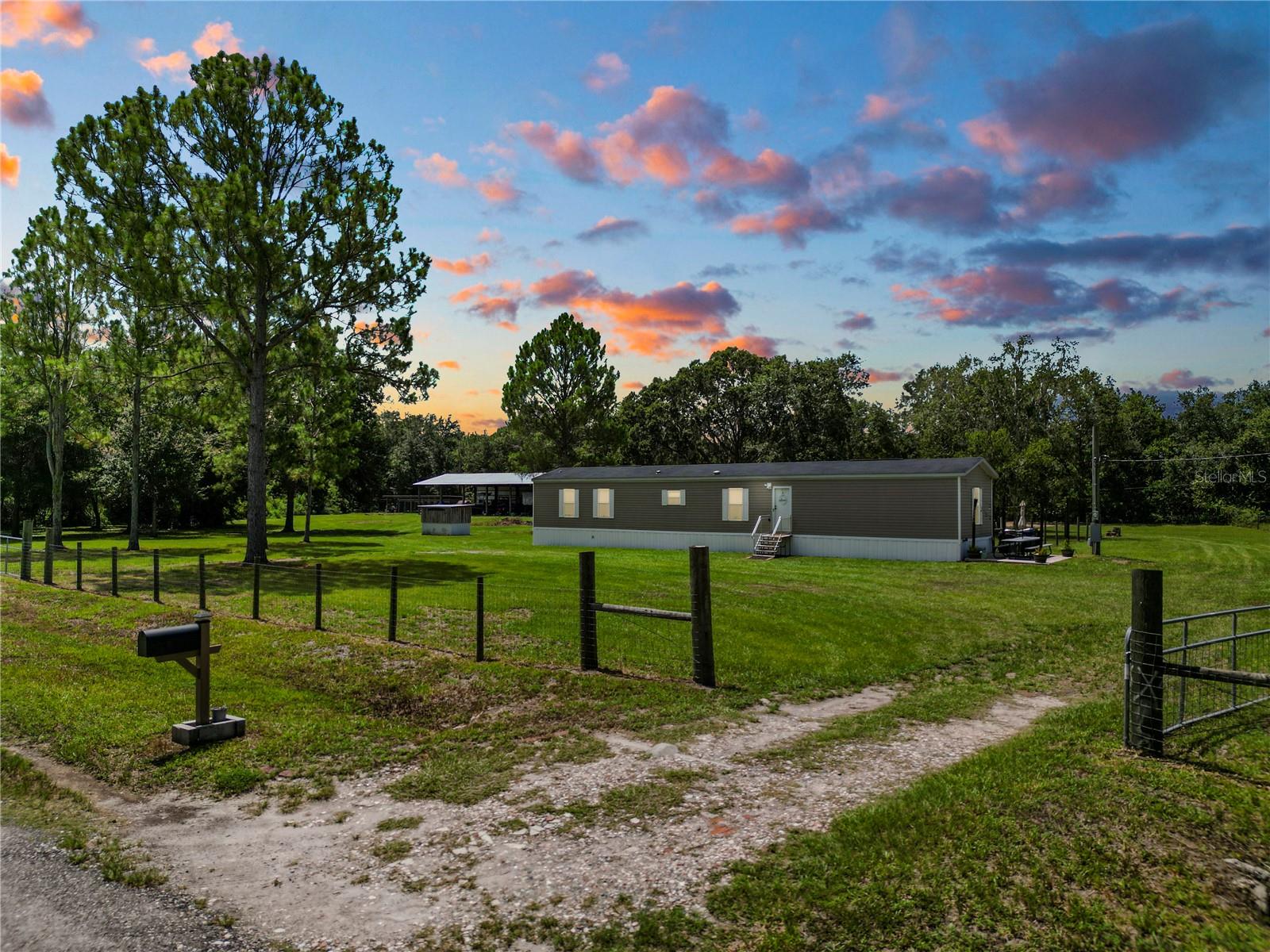 Welcome to Your Own Slice of Country Paradise!!!
Discover the perfect blend of peace, privacy, and possibility. Tucked away on a spacious 3.5-acre lot with a 2019 build, avoid the headache of repairs and remodels. This unique property offers the ideal setting for those who crave space to spread out, room to grow, and freedom to live the lifestyle they love.
Bring your animals, toys, and big dreams—this property is ready for it all! You’ll love the 40x60, 5-bay pole barn with a designated bay with reinforced rebar and concrete ready for a 2 post car lift, perfect for storing equipment, RV's, off road vehicles, or creating the ultimate workshop. Whether you're a hobbyist, mechanic, or small business owner, this versatile structure adds incredible value.
Pet lovers and animal enthusiasts will be thrilled with the established 10x40 dog kennel setup, complete with water connections and easy access to electric—making it easy to operate a boarding kennel, hobby kennel, or simply provide the best for your furry friends.
The land offers wide-open spaces with mature trees and endless possibilities—from starting a garden or building additional structures, to simply enjoying peaceful country living just minutes from town.
Don't miss this rare opportunity to own acreage with infrastructure already in place!! Schedule your showing today and come experience the charm and potential of Country Side Drive living!