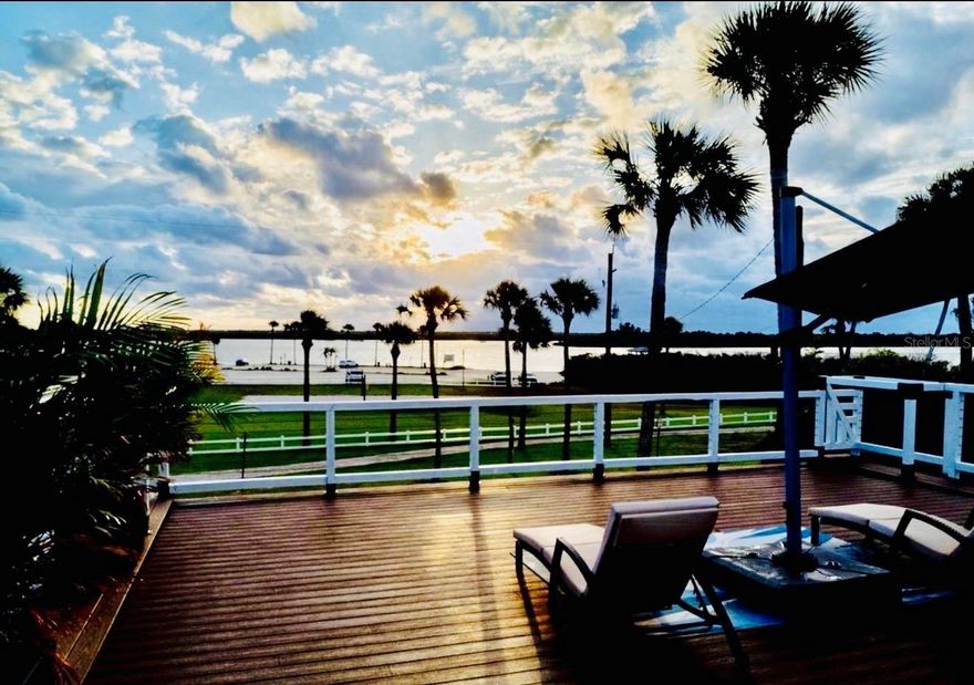 Intracoastal views from nearly every room, 2,286 SF of living space, 1,500+ SF of outdoor entertaining and lounge space, and a rooftop sunrise deck on a 10,584 SF corner lot. This 3-bedroom, 3-bath South Riverside coastal retreat sits directly across from Menard-May Park, the public boat ramp, fishing dock, and Intracoastal Waterway — offering water views, boating access, covered lounge areas, rooftop entertaining, and rare indoor-outdoor coastal living without direct waterfront maintenance.

Designed around light, views, and comfort, the home features spacious open living areas, a large kitchen, walk-in pantry, dedicated laundry room, enlarged bedrooms, redesigned bathrooms, guest-suite flexibility, and a converted garage living area.

Far beyond a cosmetic remodel, the home was stripped down to the studs and fully reimagined. Interior walls, plaster, drywall, insulation, electrical, plumbing, HVAC, doors, windows, and finishes were removed or reworked to create a fresh modern coastal layout built for the way people actually live.

This is a rare South Riverside opportunity combining Intracoastal views, rooftop entertaining, boating access, a spacious corner lot, and a builder-reimagined coastal home across from one of Edgewater’s best waterfront parks.