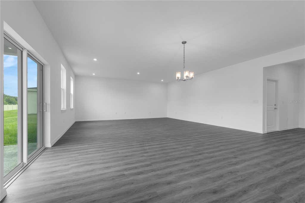 Photo of 1342 Dunblane Way NE, Palm Bay, FL 32905 (MLS # O6434296)