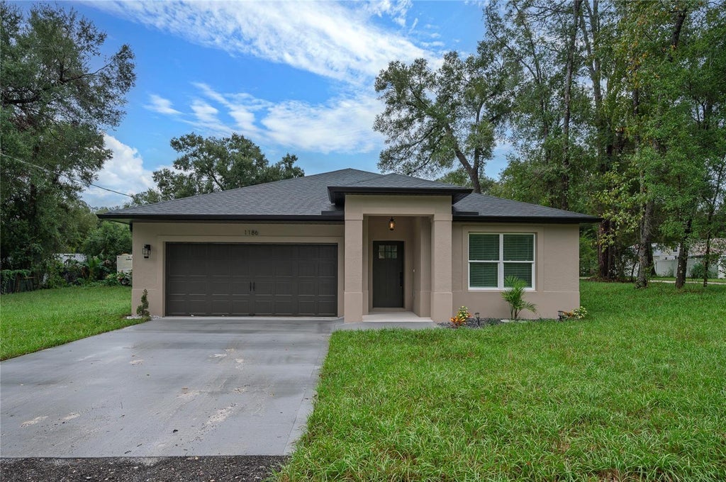 Photo of 1186 7th Street, Orange City, FL 32763 (MLS # O6448883)