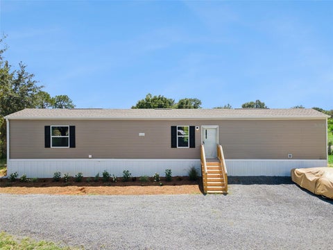 Photo of 80 American Way, Frostproof, FL 33843 (MLS # O6439597)