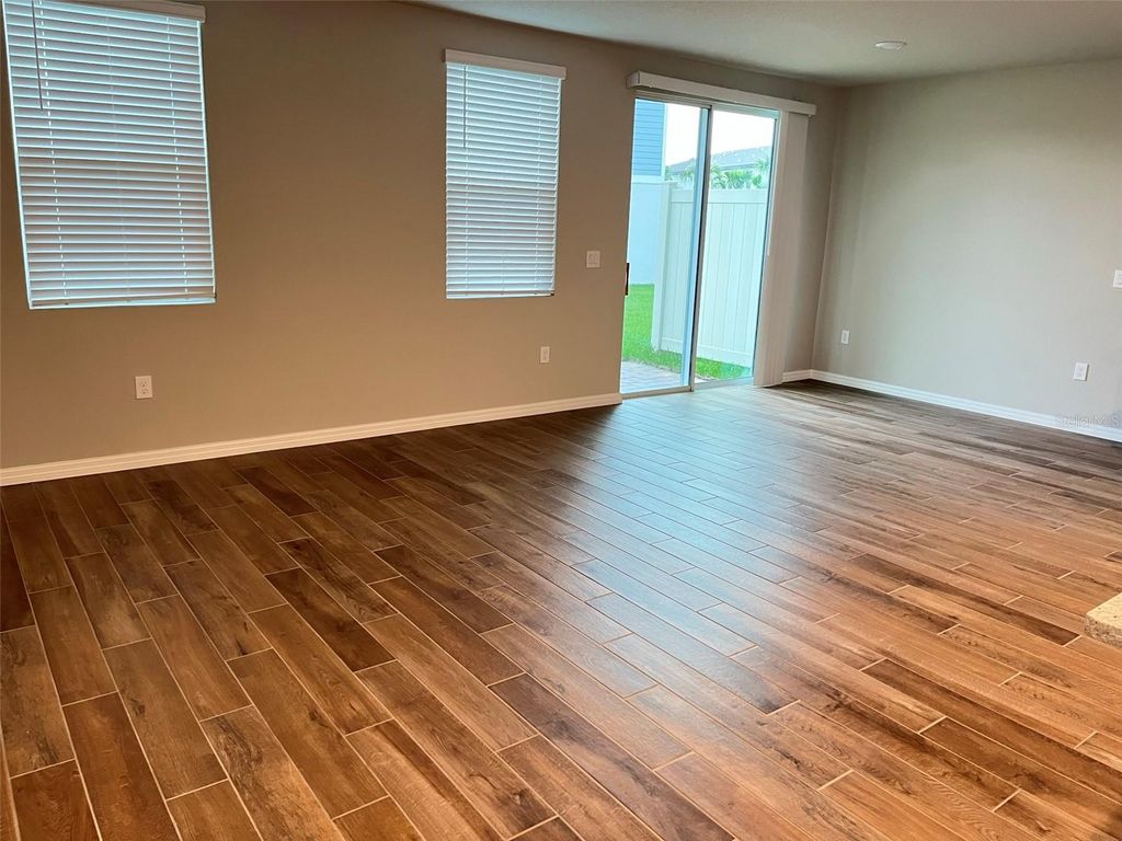 Photo of 437 Legacy Loop, Davenport, FL 33896 (MLS # O6409881)