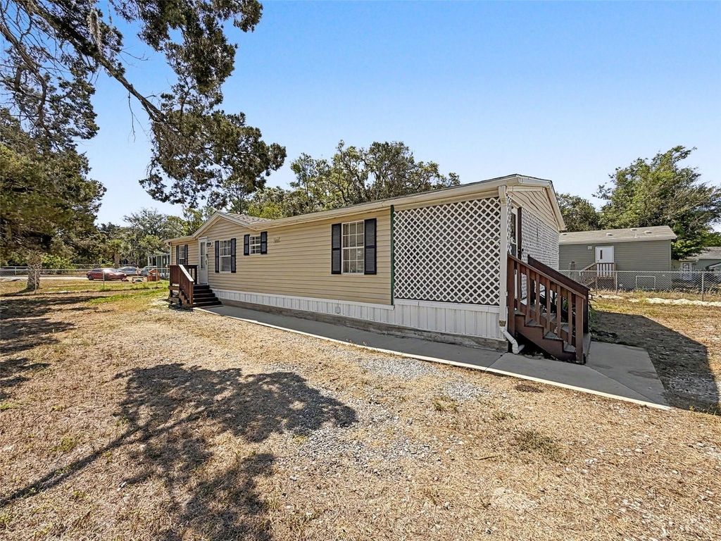Photo of 15936 Archer St &amp; 9718 Denton Ave., Hudson, FL 34667 (MLS # W7885080)