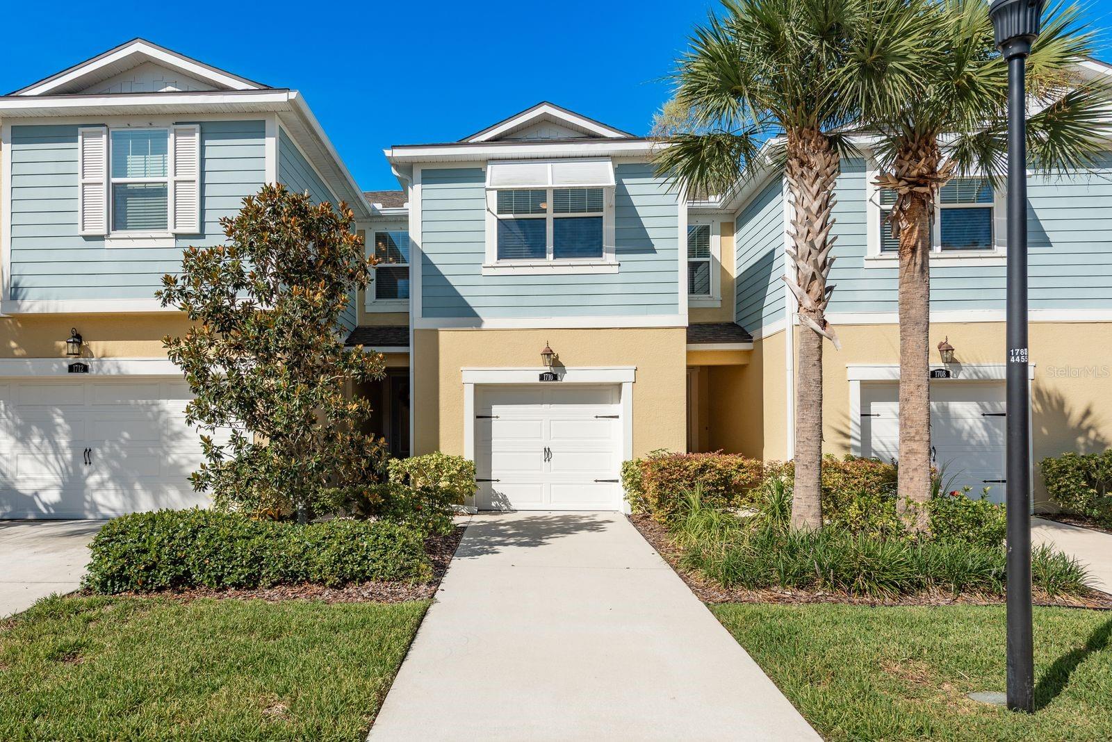 Discover comfort and luxury in this meticulously maintained townhome in the exclusive gated waterfront community of Bayside Terrace, offering an ideal blend of open concept living and private retreats. Boasting 2 generous primary bedrooms with full ensuite bathrooms, and a large versatile upstairs loft. Step inside and be greeted by an inviting open floor plan on the main level, seamlessly connecting the kitchen, dining room, and living room. The expansive layout features elegant tile flooring throughout, ensuring both durability and easy maintenance. The heart of the home in the kitchen, is a culinary dream, showcasing classic white wood cabinets, a chic tiled backsplash, and stainless-steel appliances. Expansive quartz countertops provide ample food prep space, complementing the large walk-in pantry, perfect for all your storage needs. The spacious living room seamlessly extends to the outdoors through sliding glass doors, leading to a serene screened-in lanai. Here, you can relax and unwind while enjoying picturesque views of lush green space and mature trees. A convenient half bathroom is thoughtfully located on the main floor for guests. Upstairs, plush carpeting creates a cozy and quiet ambiance throughout. The luxurious primary bedroom is a true sanctuary, featuring two generous walk-in closets, providing abundant storage. Its private ensuite bathroom offers a spacious walk-in shower, and an expansive double vanity topped with elegant granite.
The second large bedroom also boasts a walk-in closet and conveniently has a second ensuite full bathroom, which includes a walk-in shower and a double vanity with granite. Adding to the home's practical design, the laundry room is also conveniently located upstairs.
Completing this exceptional town home is a single-car garage, offering secure parking and additional storage and hurricane shutters. This home perfectly combines modern amenities, thoughtful design, and a prime location for a truly comfortable and convenient living experience.
Living in this townhome offers a maintenance free lifestyle and the community offers an array of resort-style amenities, including a gorgeous infinity swimming pool, grill terrace, and access to gather around the fire pit overlooking the bay for memorable evenings. For water enthusiasts, the community dock with kayak, paddle board, and canoe launch provides direct access to the water. Peace of mind is ensured with a security gate, and staying active is easy thanks to the well-equipped community gym.
The HOA payment includes access to the community amenities, maintenance of the gorgeous landscaping and the exterior of your home. It also includes your cable, Internet, water, sewage and trash. The seller has VERY LOW, TRANSFERABLE FLOOD POLICY to the buyer!!
This home is ideally located close to Tampa airport, gorgeous Gulf beaches, quaint towns like Safety Harbor and Dunedin, lots of shopping and fabulous restaurants.
