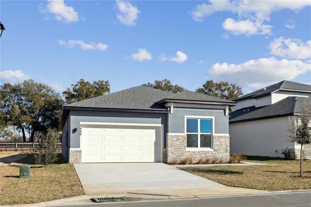 Photo of 82 Springwood Drive, Palm Coast, FL 32137 (MLS # FC319263)