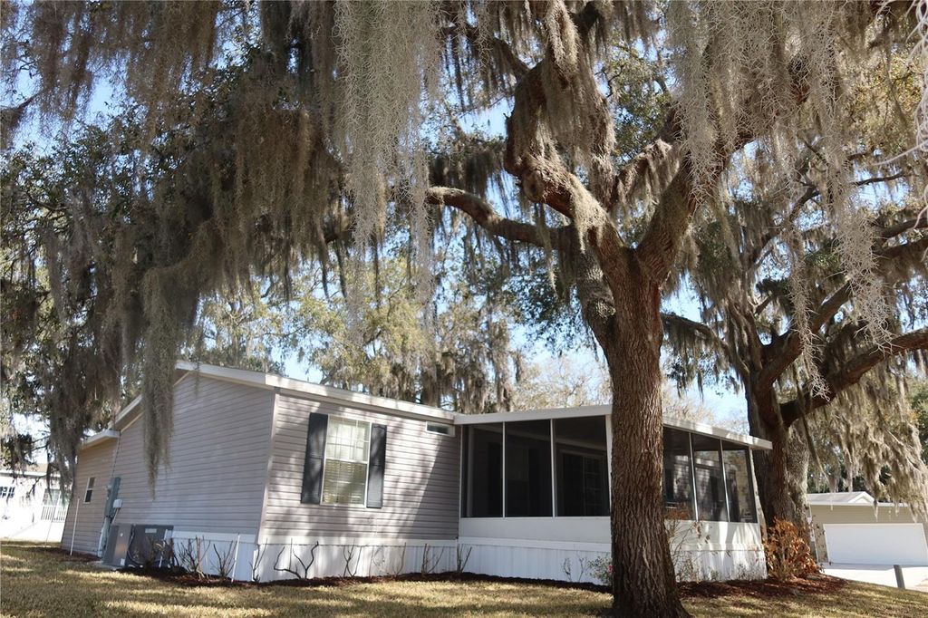 Photo of 25157 Buttonwood Drive, Astatula, FL 34705 (MLS # O6385175)