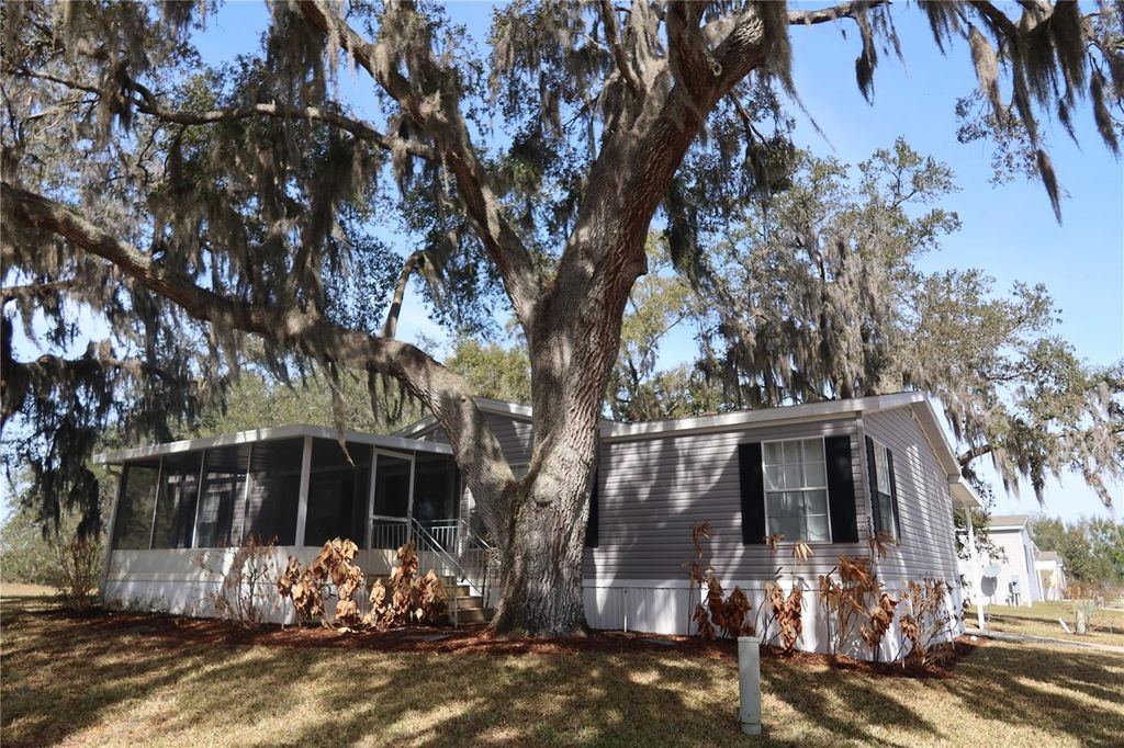 Photo of 25157 Buttonwood Drive, Astatula, FL 34705 (MLS # O6385175)