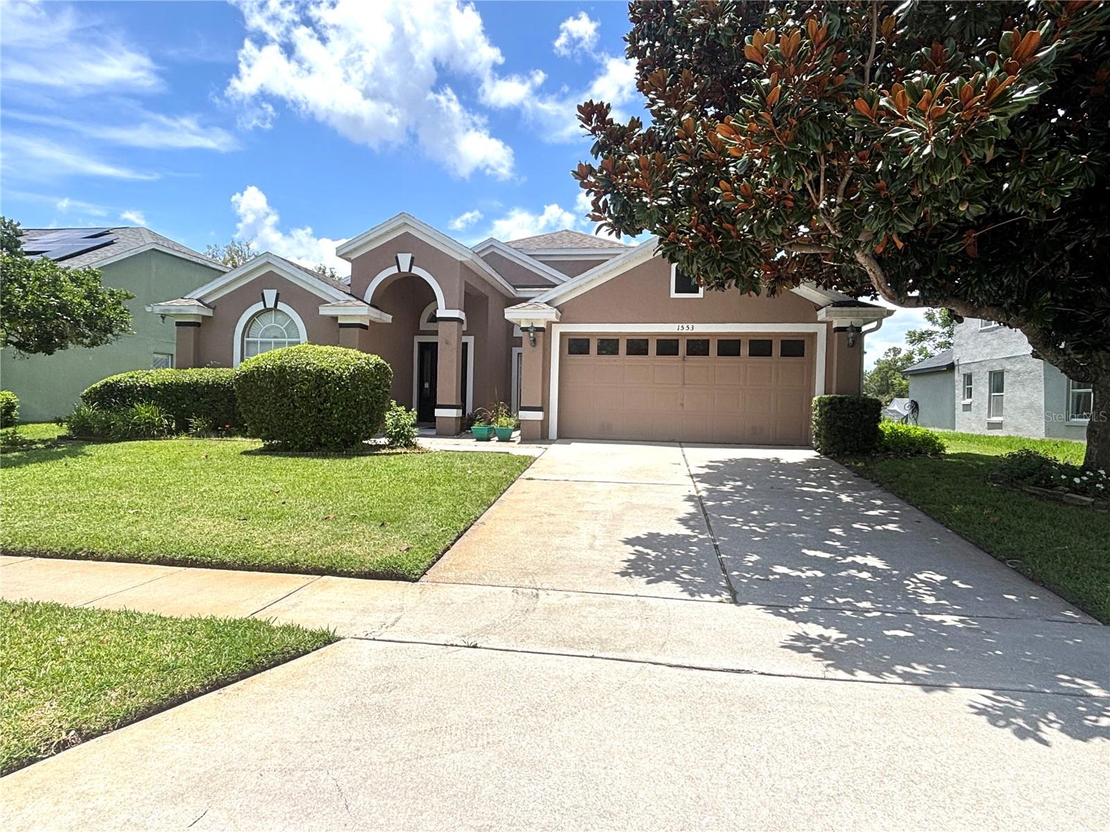 Welcome to 1553 Maidencane Loop, a charming 4-bedroom, 2-bathroom single-family home located in the desirable Little Creek neighborhood of Oviedo, FL. Built in 1997, this well-maintained home offers a bright and open floorplan with tile and hardwood-style flooring throughout, central heating and air, and a spacious 2-car attached garage. The stucco exterior, concrete foundation, and inviting outdoor patio create a classic Florida feel with plenty of potential for outdoor living. Situated on a generous lot in a family-friendly community, the home is conveniently close to top-rated schools, UCF, and major roadways including Alafaya and University Boulevards. This move-in-ready home is a perfect blend of comfort, location, and lifestyle. Act now! This one won't last long! All applicants are required to do a credit and background check. Renters insurance is required.