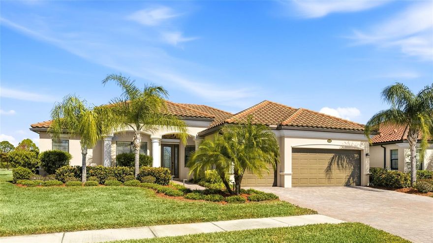 THIS IS THE ONLY ONE ON THE MARKET! This is one of the most popular plans ever built in Gran Paradiso and they do not come available very often. No other layout in Gran Paradiso matches this home's unparalleled sense of openness. This home combines the huge open island kitchen design with the 12’ high Tray ceilings and taller 8ft interior doorways found only in the Estate series and custom homes. The den near the entry foyer features elegant 8 ft French doors that blend seamlessly with the living space. Further enhanced by elegant porcelain tile flooring throughout the entire home including bedrooms & den, promoting a seamless and open feel from room to room.
Thoughtful split-plan layout. On one side, the luxurious owner's suite serves as a serene retreat with a spacious walk-in closet, en-suite bath featuring dual vanities, a walk-in shower, and soaking tub, plus direct lanai access for seamless indoor-outdoor flow. Flooded with natural light, the suite includes charming bay windows that frame beautiful views and add an inviting, expansive touch to your private oasis. Across the home, two secondary bedrooms share a full bath, with a convenient and often hard to find half bath off one bedroom doubling as a pool bath—ideal for Florida's resort lifestyle.
Thoughtful upgrades enhance comfort and style: draperies and hardware on all windows/sliding doors, overhead lighting in every room, ceiling fans in all bedrooms and lanai, doubled hanging space in closets, a new Bosch dishwasher, recently new hot water heater, and 42-inch upper cabinets in the laundry.
This home includes a Kinetico whole-house water softener. The coveted 3 Car Garage offers insulated garage doors for better temperature control. Outdoors, resort-style living shines with upgraded LED color-changing pool lights, SeaGlass Illuminations LED accent lighting around the pool deck for evening ambiance, and low-voltage front yard landscape lighting for curb appeal and safety.
THE NEIGHBORHOOD Gran Paradiso, a premier gated community nestled within the vibrant master-planned enclave of Wellen Park in Venice, Florida. This Tuscan-inspired haven spans over 1,000 acres. Over 60% of the neighborhood is wooded preserve or pond.The grand clubhouse serves as the heart of the community, featuring a state-of-the-art fitness center, aerobics and yoga studios, sauna and steam rooms, a library, card room, and billiards. Dive into relaxation at the heated resort-style pool with zero-entry access, and a separate spa, or stay active on lighted tennis courts, lighted pickleball courts, and miles of sidewalks throughout the neighborhood. A full-time activities director ensures a calendar brimming with social events, classes, and gatherings. Gran Paradiso's prime location puts the best of Southwest Florida at your doorstep. Just 1 mile from the lively Downtown Wellen Park with its shops, dining, and entertainment, 9 miles to charming downtown Venice, 7 miles to pristine Gulf Coast beaches for sun-soaked days, and a mere 1.2 miles to the brand-new Costco for everyday conveniences. Proximity to US-41 and I-75 offers easy access to the Atlanta Braves' CoolToday Park spring training facility, championship golf courses, boating opportunities, cultural events, and more. Gran Paradiso delivers timeless architecture, maintenance-free living, and a secure, gated environment.