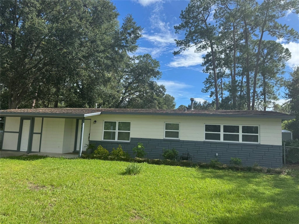 Photo of 1421 NE 18th Avenue, Gainesville, FL 32609 (MLS # GC543472)