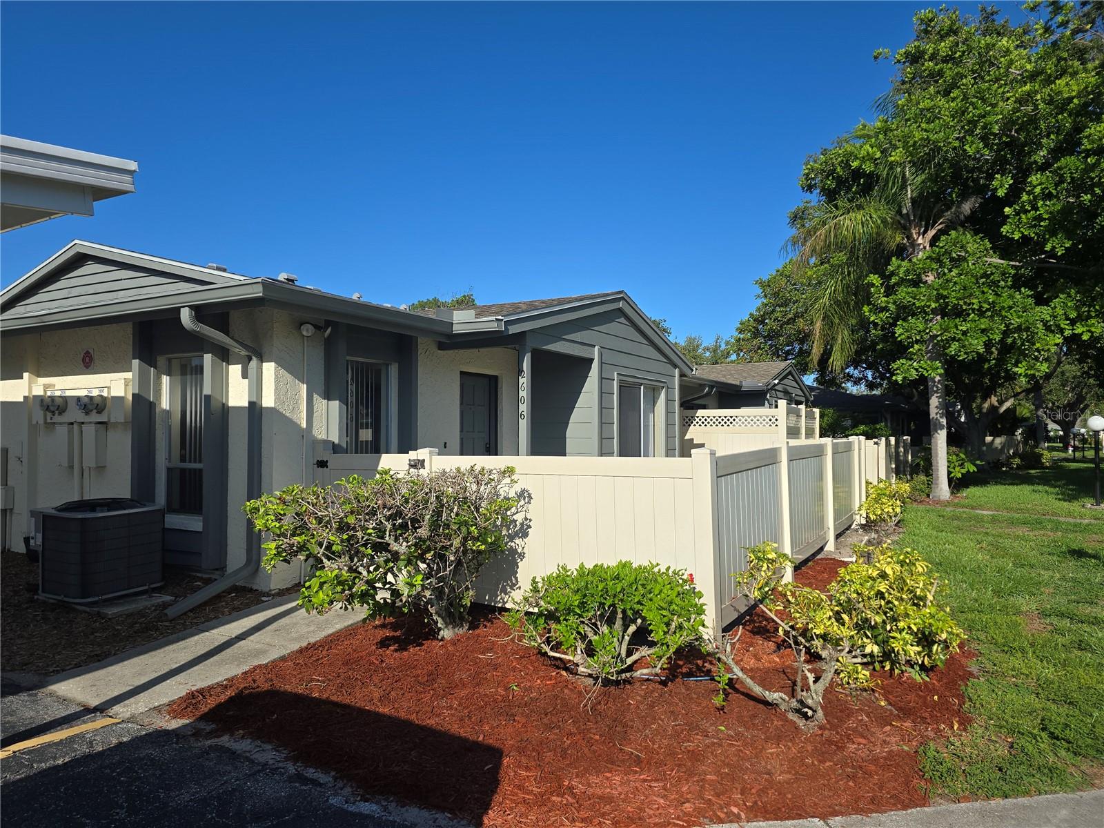This updated 2 bedroom 2 bath condo is neat and clean and ready for you to move right in!! This is a one story villa style condo with your assigned covered parking space right next to your front door!! Granite counters in the kitchen and baths. Crown molding throughout. The A/C was installed in 2022 and the roof is new in 2024. There is an indoor laundry room with a newer washer and dryer and the HWT is only 4 years old. There are two privacy fenced patios for your enjoyment. Two pets are allowed per unit- under 30 lbs each. Rentals are allowed with a 30 day minimum. Close to public transportation. Courtyard Square has a heated pool and a clubhouse. All lawn care and pest control as well as basic cable, internet, and wifi are all included in the monthly condo fee. It is also located close to shopping, dining, golfing, fishing, hiking and GT Bray Park. And you're less than 15 minutes from the world class white sandy beaches of Anna Maria Island! Call today for your private showing!