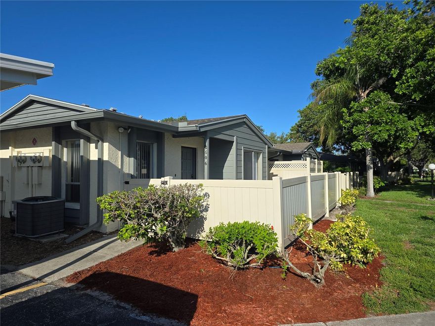 This updated 2 bedroom 2 bath condo is neat and clean and ready for you to move right in!!  This is a one story villa style condo with your assigned covered parking space right next to your front door!! Granite counters in the kitchen and baths. Crown molding throughout. The A/C was installed in 2022 and the roof is new in 2024. There is an indoor laundry room with a newer washer and dryer and the HWT is only 4 years old. There are two privacy fenced patios for your enjoyment. Two pets are allowed per unit- under 30 lbs each. Rentals are allowed with a 30 day minimum. Close to public transportation. Courtyard Square has a heated pool and a clubhouse. All lawn care and pest control as well as basic cable, internet, and wifi are all included in the monthly condo fee.  It is also located close to shopping, dining, golfing, fishing, hiking and  GT Bray Park. And you're less than 15 minutes from the world class white sandy beaches of Anna Maria Island!  Call today for your private showing!