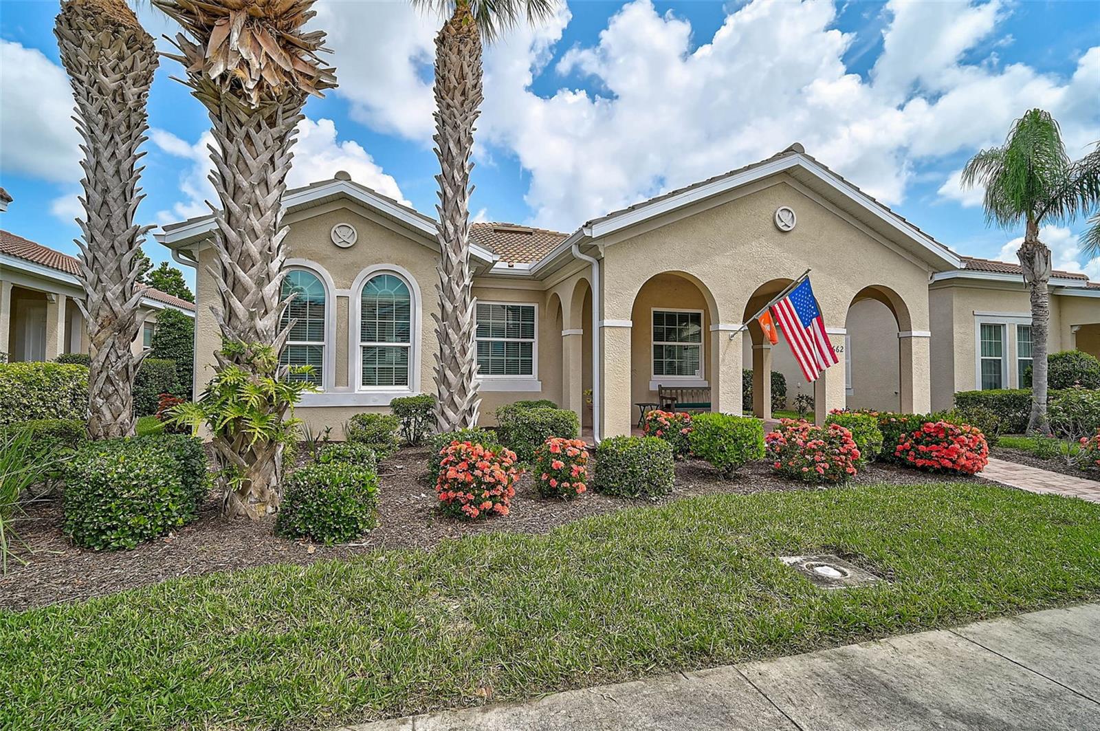 Location, location…that’s what you will have with this Fossano Drive home. What is not to like with about a 15 minute walk to Publix, a bank, or gas station for those quick errands and even a fire station for unforeseen emergencies. You will be the envy of everyone in the neighborhood with your installed PGT WIN-GUARD HURRICANE IMPACT WINDOWS throughout, including SLIDERS & GARAGE OVERHEAD DOOR which eliminate the need for storing cumbersome shutters, installing and removing during hurricane season…what a huge benefit! This home offers not only storm protection and significant savings but invaluable, year-round peace of mind. This meticulously maintained 3-bedroom, 2-bath single-family residence is now available in the highly sought-after, resort-style community of Isles of Sarasota located in Palmer Ranch. Inside, the home features high ceilings and an open, spacious floor plan with tile flooring flowing through the main living areas, ensuring ease of maintenance and a clean, modern aesthetic look. The kitchen is equipped with NEWER, stainless-steel appliances, granite countertops, and an eat in area large enough to accommodate six guests, perfect for casual dining. The combination living area and dining space is ideal for those family and holiday dinner parties. The spacious primary suite hosts a walk-in closet, an additional second closet and has direct access to your private lanai. The primary bath was thoughtfully designed with a soaking tub, walk-in shower and dual sinks. Freshly painted interior with soft, neutral tones, coupled with the light-filled residence, creates a comfortable and relaxing ambiance. There is a NEW HVAC unit in 2021, whole-house REVERSE OSMOSIS water filtration system provides great tasting and clean water and there is a convenient separate indoor laundry room. Brick pavers adorn the front entryway with a cozy sitting area, while the rear-facing driveway allows for quick access from the garage to the home. Step onto the expansive screened lanai, where you’ll enjoy private and tranquil views, perfect for relaxing or entertaining. With a low HOA fee that includes blue stream BASIC CABLE & INTERNET, ADT basic, IRRIGATION, LAWN MOWING, MULCHING, and TRIMMING, making lawn maintenance effortless. Residents benefit from an array of premium amenities, including a recently renovated 11,000 sq. ft. clubhouse, a fully equipped FITNESS CENTER, and a HEATED resort-style pool. A vibrant social calendar offers activities such as bocce ball, pickleball, shuffleboard, basketball, tennis, and a playground for younger residents. Perfectly positioned near top-rated schools, premier shopping, 2 blocks from Publix, fine dining, medical facilities, and the pristine Gulf Coast beaches. Easy access to I-75, Legacy Trail, and Oscar Scherer State Park—this home is the perfect blend of COMFORT, ELEGANCE & PEACE OF MIND!