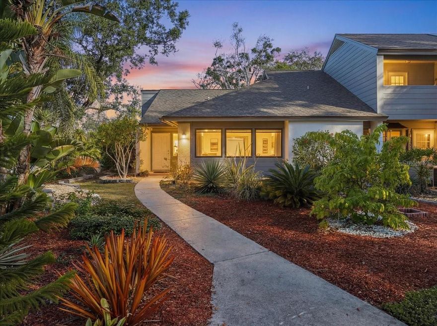 New to Market | Eagle Chase Villa – Sarasota.  Ideally positioned in the desirable Eagle Chase community, this impeccably upgraded 2-bedroom, 2-bath villa offers 1,268 square feet of thoughtfully enhanced living space just minutes from beaches, nature, shopping, and downtown Sarasota. Located within walking distance to the 84-acre Red Bug Slough Nature Preserve and only 2.1 miles to Crescent Beach and 3 miles to Siesta Key, this home delivers the perfect blend of location, quality, and peace of mind. Inside, the residence reflects years of careful investment and pride of ownership, with over $125,000 in renovations and improvements completed since 2020. The home has undergone extensive mechanical and structural upgrades, including a near full plumbing re-pipe with the removal of old cast iron and replacement with CPVC, new electrical breakers, all-new outlets, plate covers, and modern dimmable LED lighting throughout. HVAC systems have been replaced and professionally serviced twice yearly, the roof was replaced in 2022, and impact-rated windows and doors were installed for comfort, efficiency, and storm protection. The kitchen has been beautifully updated with quartz countertops, painted cabinetry with new hardware, tile backsplash, LED under-cabinet lighting, an upgraded oven range, undermount sink, and newer appliances, creating a bright and functional space that flows effortlessly into the living areas. Both bathrooms were fully remodeled down to the studs with waterproofing, new drain lines, Moen fixtures, custom tile, rain shower heads, quartz vanities, beveled window detail in the primary bath, and LED lighting with dimmers, offering a spa-like experience. Living space was thoughtfully expanded with the creation of a stunning Florida Room, replacing the former lanai and deck. This space features impact sliding doors and windows, reinforced flooring, custom Italian tile, fresh paint, updated electrical, and a ceiling fan with remote, seamlessly blending indoor and outdoor living. New composite decking was added on a reinforced foundation along the rear of the home, with additional composite decking on the side porch, while the exterior rear stucco wall was repainted for a polished finish. Additional enhancements include plantation shutter doors throughout the hallways, bedrooms, and primary bath, refreshed interior doors and hardware, updated flooring in the primary bedroom, attic flooring for storage, and a mounted 65" Sony flat-screen TV with in-wall wiring that will convey. The home has also been meticulously maintained with comprehensive termite prevention, Sentricon bait systems, and ongoing annual inspections showing zero termite activity. Outside, the property has been transformed into a serene, park-like setting with engineered paver stone retaining walls designed to enhance drainage, extensive hardscape and landscaping improvements, indigenous Florida plantings, fruit trees, pollinator-friendly gardens, and low-maintenance decorative stone features. The location offers exceptional convenience with nearby shopping, easy access to I-75, downtown Sarasota, Venice, St. Petersburg, Tampa, and Clearwater, making this home ideal as a primary residence or refined coastal retreat. This Eagle Chase villa stands apart for its depth of upgrades, quality craftsmanship, and unmatched proximity to Sarasota’s best natural and coastal amenities.