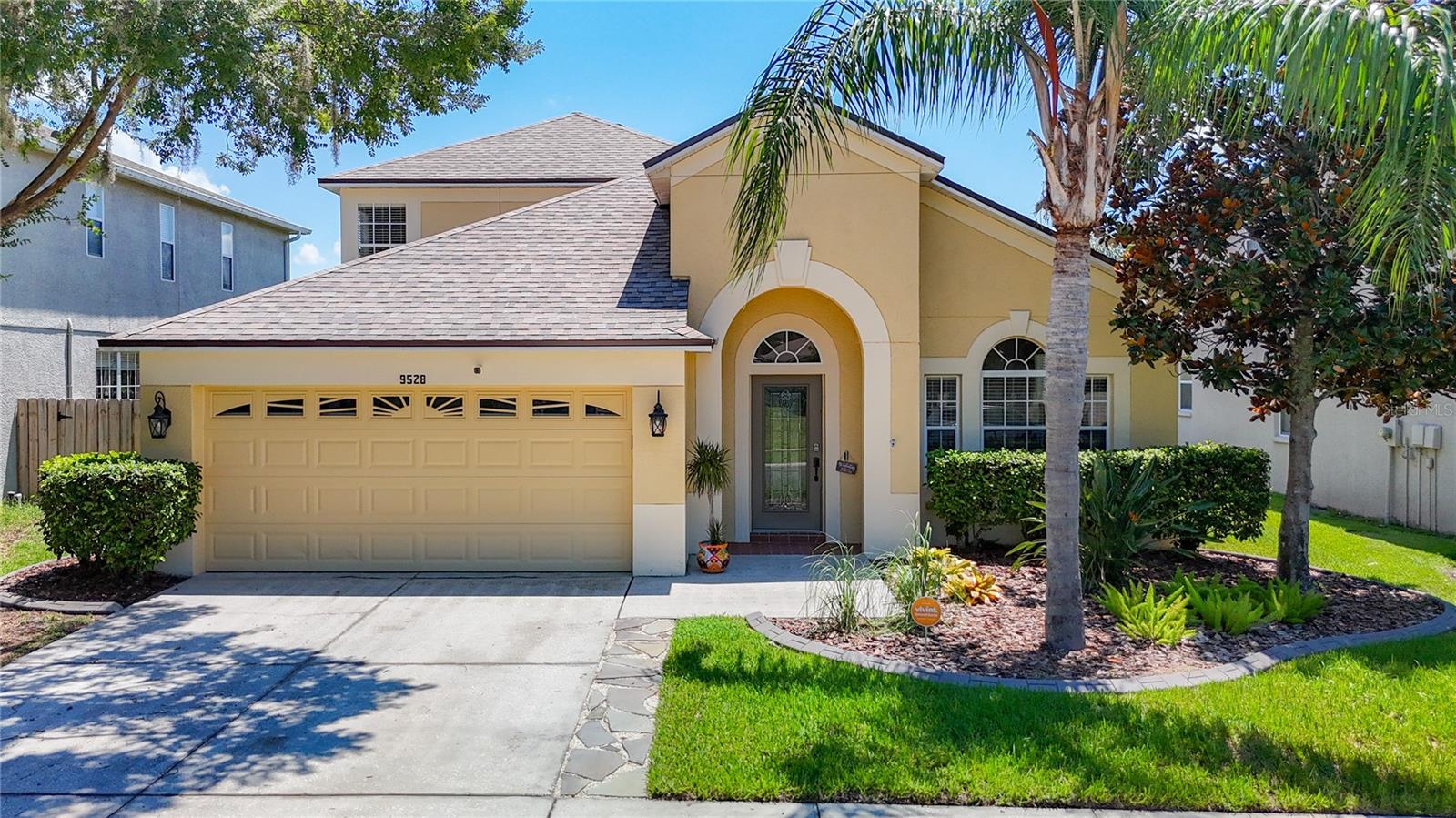 Brand new roof just installed in this spacious 4-Bedroom, 3-Bath retreat featuring an upstairs loft. Nestled in the Asbel Estates Community, this elegant two-story home delivers an exceptional blend of comfort, space, and breathtaking natural scenery. With stunning pond and conservation views that capture the essence of peaceful living, this residence is thoughtfully designed to accommodate both quiet relaxation and vibrant gatherings. Step through the front door to discover a welcoming open-concept layout. The main floor boasts a bright, airy living area with a spacious family room/kitchen combo equipped with stainless-steel appliances, abundant cabinetry, and a generous island with butcher block counters, perfect for casual dining or entertaining guests. The master bedroom ensuite and two well-appointed bedrooms are located on the main level, offering flexibility for guests. The primary suite boasts an ensuite bathroom complete with a garden tub, a separate walk-in shower, dual sink, and a walk-in closet. As you ascend the staircase, you’re greeted by a spacious loft—an ideal space for a playroom, media center, or additional lounge. The upper level is truly a private haven, featuring the 4th bedroom and 3rd bathroom. Step outside to a spacious patio where you can sip morning coffee as the sun rises over the water, or host summer barbecues framed by lush landscaping with landscape curbing and tranquil pond views. The fenced backyard with a separate paver patio that is perfect for grilling, provides endless opportunities for outdoor enjoyment, whether you’re gardening, playing, or simply relaxing. Other amazing features include AC 2022, water heater 2022, epoxy garage floors, water softener and a filtration system. Low HOA, NO CDD and No flood insurance requires. Asbel Creek Estates has basketball courts, playground, picnic areas, volleyball, dog park, and walking trails. Conveniently located close to top rated schools, trails, shopping, restaurants, Angeline Athletic Complex, Academy of Innovation, Hospital, trails, Suncoast Parkway, top rated golf courses, and so much more.