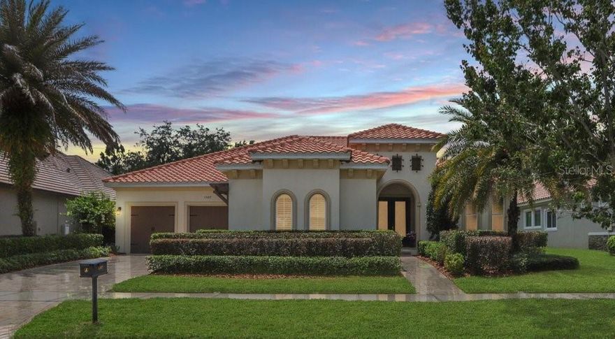 Exquisite, custom-designed Mediterranean-inspired Cardel Mizner model home in the highly sought-after, gated community of FishHawk Preserve. This rare one-story Mizner plan offers 4 bedrooms plus a private den, 3 baths, and a 3-car garage, thoughtfully tailored for both elegance and everyday comfort. Arrive to lush landscaping, a welcoming wide porch, a paver driveway, and an oversized garage with abundant overhead storage. Inside, the foyer opens to rich wood floors and a striking stone-accented gas fireplace. The bright great room features decorative 12’ beam ceilings, a coffered-panel feature wall, crown molding, and pocket sliding glass doors that seamlessly connect to the outdoor living area. A separate formal dining room—finished with crown molding, wainscoting, designer lighting, and upgraded chandeliers—pairs beautifully with a Butler’s Pantry complete with a wine refrigerator. The expansive gourmet kitchen is a showpiece, offering tall soft-close cabinetry, a dramatic counter-to-ceiling tile backsplash, 4"-thick quartz countertops, a closet pantry, stainless steel appliances, a deluxe gas range with hood, a center island, and a spacious eat-in breakfast nook. The secondary bedrooms are generously sized and feature plantation shutters, walk-in closets, wood floors, and continued crown molding. A built-in study area in the hallway adds smart functionality, keeping bedrooms true retreats. Both secondary baths are beautifully appointed with tile to the ceiling, water closets, and full showers. The split floor plan creates a true owner’s sanctuary: the primary suite is accessed through a private hall with two full-length mirrors, a custom barn door leading to the en suite bath, and two walk-in closets. The suite itself showcases a tray ceiling, coffered walls, stone accents, custom nightstand lighting, plantation shutters, and serene views of the pool and private backyard. The spa-inspired en suite offers a large double-head shower, an expansive soaking garden tub with mounted TV, a one-of-a-kind, backlit designer stone vanity backdrop, and a separate water closet. A dedicated den with French doors is ideal for working from home—bright, airy, and finished with plantation shutters and wood flooring for added sophistication. Outside, enjoy Florida living at its finest with an expansive screened lanai featuring travertine tile, a pool and spa, and a fully equipped outdoor kitchen—perfect for entertaining or unwinding in peace. The lush, landscaped backyard provides privacy while still offering space to enjoy. With A-rated schools, miles of walking trails, abundant community amenities, gated privacy, and convenient access for commuting, this exceptional home is truly one of a kind.