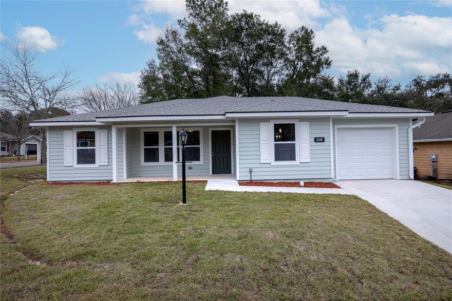 One or more photo(s) has been virtually staged. Welcome home to a brand-new 2025 single-family residence in Lana’s Place offering a smart, comfortable layout with 3 bedrooms, 2 full baths, and 1,166 heated sq ft (1,506 total sq ft). Enjoy the convenience of single-story living, a 1-car attached garage with door opener, durable HardiPlank®-type exterior, shingle roof, and a slab foundation. Inside, you’ll find vinyl flooring throughout the main spaces, ceramic tile in the primary bath, high ceilings, and a kitchen/family room combo designed for easy everyday living.

The home comes equipped with a gas water heater, refrigerator, range hood, microwave, and dishwasher, plus a gas range—ideal for anyone who prefers cooking with gas. Comfort is supported by a central HVAC system with a heat pump for heating and cooling, along with underground utilities and connected services including electricity, natural gas, water, public sewer, street lights, and cable availability. Outside, the 0.14-acre (6,098 sq ft) lot is noted as a corner unit, and the landscape includes Florida-friendly/native elements. The home is located in Flood Zone X.

Quick highlights:

3 bed / 2 bath | 1,166 heated sq ft

New construction (2025) in Lana’s Place

Gas range + gas water heater

Central HVAC with heat pump (heating and cooling)

1-car attached garage + opener

HardiPlank®-type exterior | vinyl floors | high ceilings