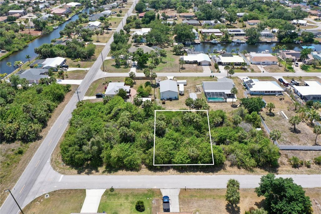 Photo of 4509 Cunningham Street, Port Charlotte, FL 33948 (MLS # C7493231)