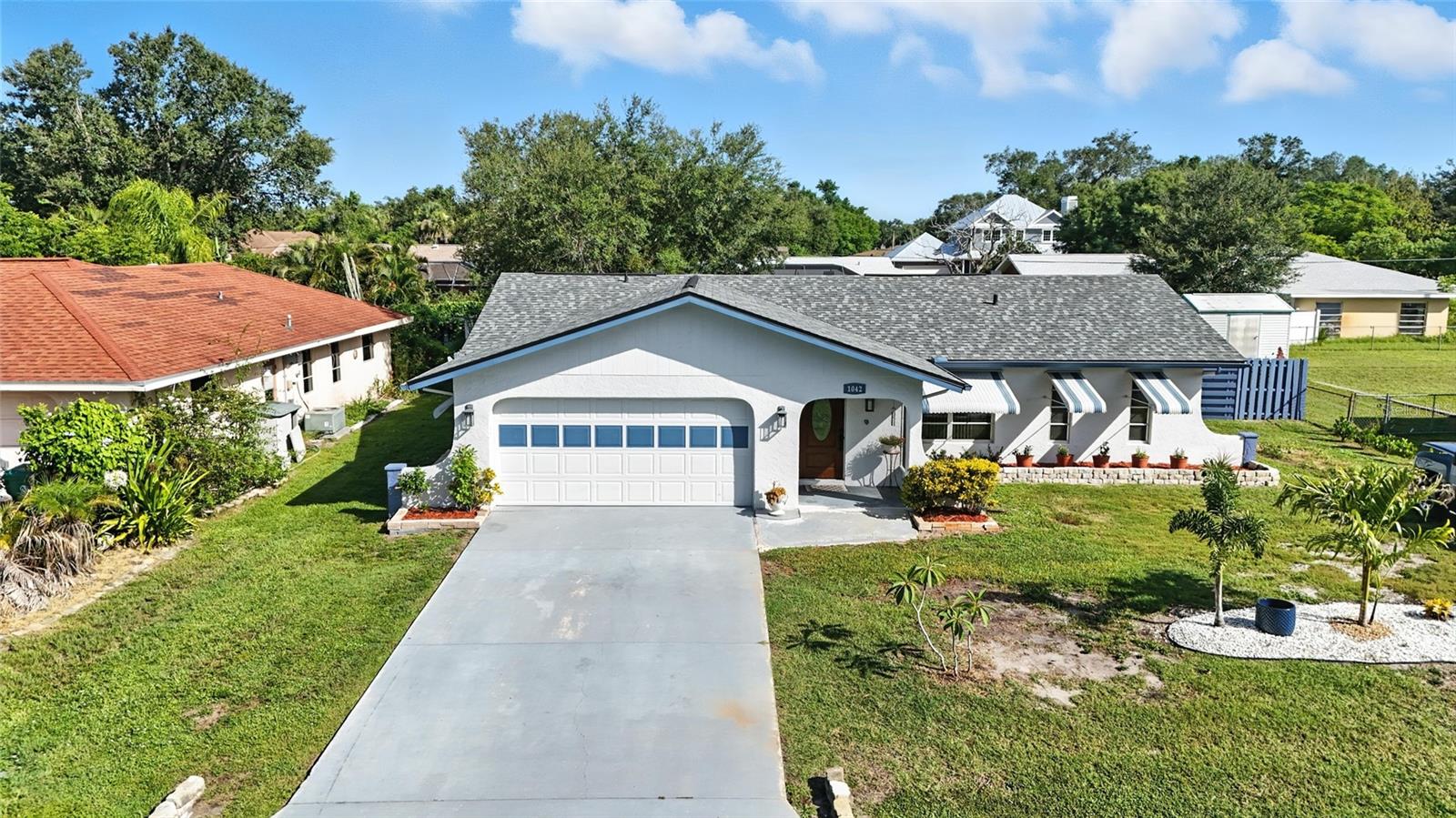 Beautifully updated 2-bedroom home in a quiet Port Charlotte neighborhood! This move-in-ready property features a new shingle roof (2021), updated central A/C and heating system, fresh interior and exterior paint, and new flooring throughout, creating a bright and modern living space.
Enjoy the flexibility of NO HOA and a large backyard with plenty of room to add a pool, garden, or outdoor entertaining area. There’s also ample parking for your boat, trailer, or RV — perfect for enjoying the Florida lifestyle.
Massive value: Located in Flood Zone X — no flood insurance required!
Conveniently located near shopping, dining, golf courses, medical centers, and just a short drive to beautiful Gulf beaches and public boat ramps. Whether you're looking for a full-time residence, seasonal retreat, or investment property, this well-maintained home checks all the boxes.
