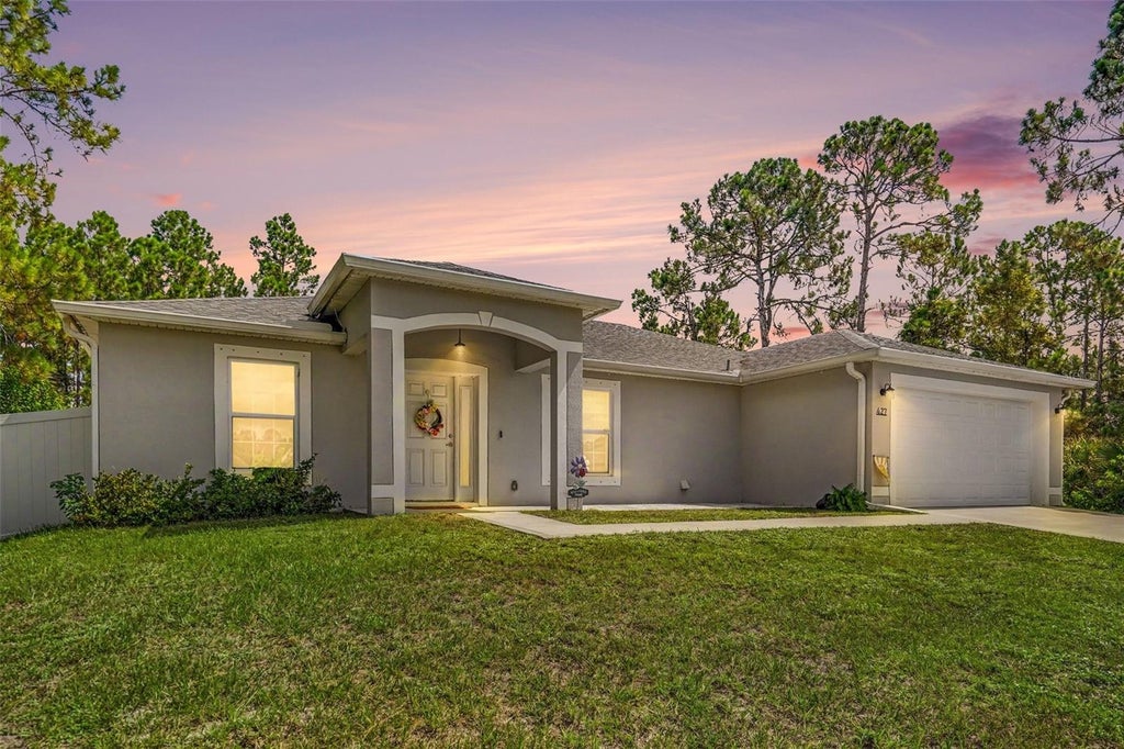 Photo of 427 SE Flagler Rd, Palm Bay, FL 32909 (MLS # O6429496)