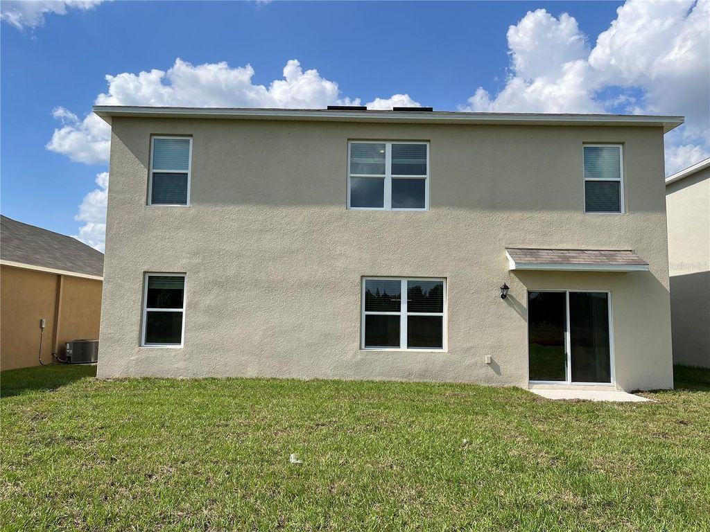 Photo of 1487 Fox Squirrel Drive, Davenport, FL 33897 (MLS # V4948573)