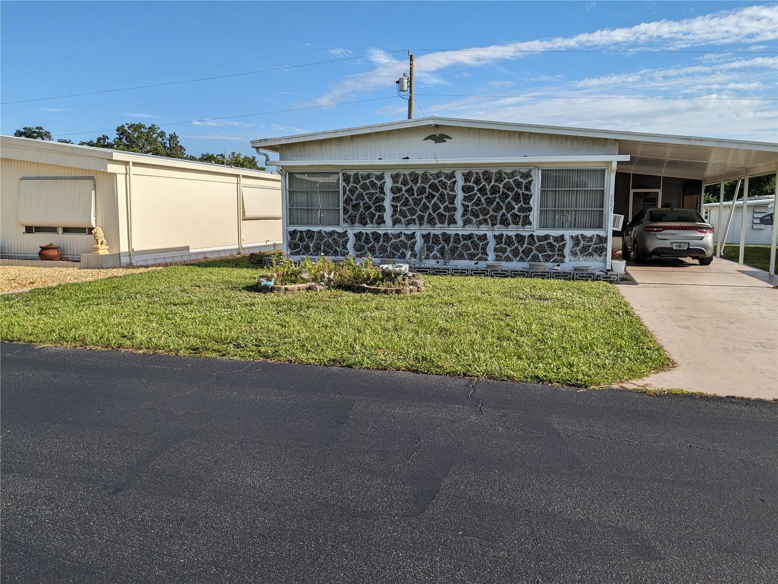 55+ Community. Ready to move in, home is furnished. Workshop Shop/Laundry room with washer & dryer and a utility sink.
Clubhouse with pool & shuffle board court on same street. Active community with lots of on going activities. Bring your golf cart. Close to distance to grocery stores, banks, restaurants and medical offices. Seller will give a $2,000 credit for flooring.