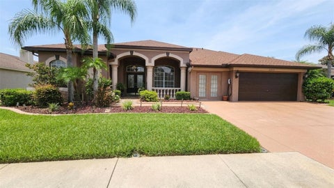 Photo of 22523 Willow Lakes Drive, Lutz, FL 33549 (MLS # TB8535438)