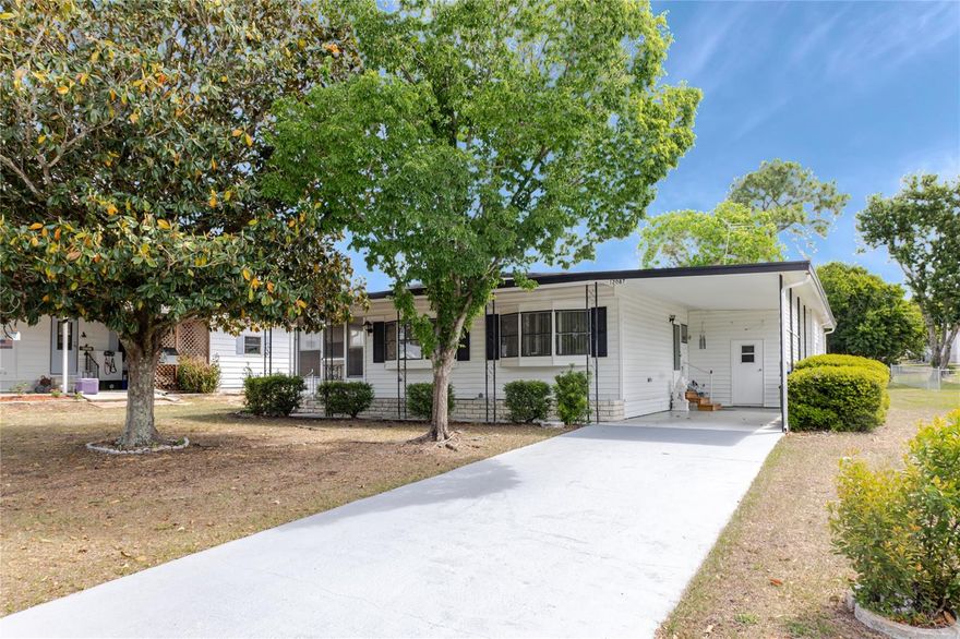 Welcome to easy, affordable Florida living in the desirable 55+ community of High Point! Located at 12087 Clubhouse Road in Brooksville, this charming 2-bedroom, 2-bath manufactured home offers 984 square feet of comfortable living space and is perfectly positioned for those seeking a relaxed retirement lifestyle or seasonal escape.

Enjoy peaceful mornings and beautiful golf course views from your screened room—the perfect spot for coffee, reading, or entertaining guests. Inside, the home offers a functional layout with plenty of natural light and inviting living spaces designed for comfort and convenience.

High Point is a vibrant, active adult community in nearby Spring Hill, offering an impressive array of amenities to keep you as active or relaxed as you’d like. Residents enjoy access to a sparkling community pool, pickleball courts, shuffleboard, bocce ball, horseshoes, cornhole, and a well-stocked library. Golf enthusiasts will love the beautifully maintained 18-hole golf course, complete with a clubhouse offering food and beverages—perfect for socializing after a round.

Conveniently located, you’re just minutes from shopping, dining, and everyday essentials. Plus, the Gulf of Mexico is only about 8 miles away, giving you easy access to fishing, boating, beaches, and breathtaking sunset views.

Whether you’re looking to downsize, retire, or find the perfect winter getaway, this home offers incredible value. Don’t miss your opportunity to enjoy the Florida lifestyle in a welcoming and amenity-rich community!