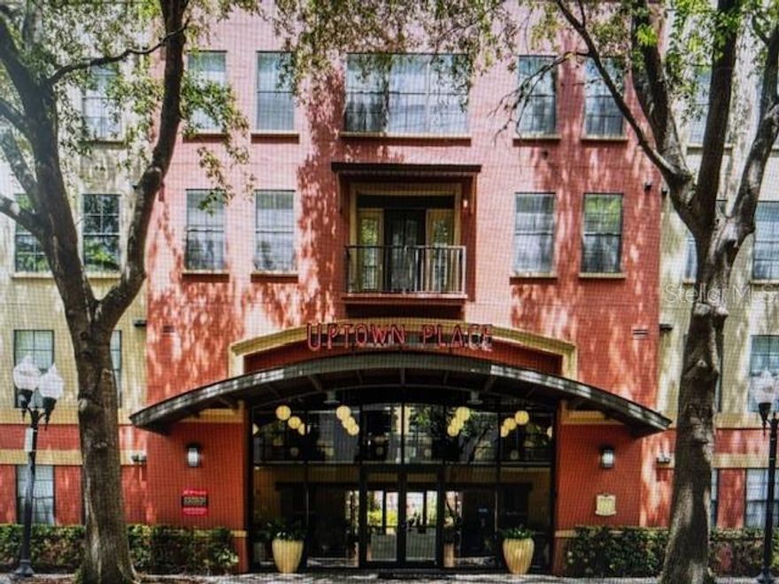 Spacious two bedroom, two bath CORNER unit in Uptown Place.  Functional split plan with large living area, dining area, and kitchen with passover bar and equipped with range, refrigerator, dishwasher. Separate laundry closet with stackable washer and dryer. Paddle fans in living room and bedrooms, walk in closet in master bedroom. Lovely balcony with south exposure and city view.  One of the most beautiful pools in all of downtown Orlando. Large fitness center and inviting resident lounge with pool table, kitchen and wide screen TV.  A convenient business center completes the amenities. Walk to restaurants, entertainment venues and just 1/2 mile to the downtown Orlando Business district. One block from I-4. This is the first opening for this amazing unit in 12 years! Lovingly cared for by existing tenant, who is relocating out of Orlando.