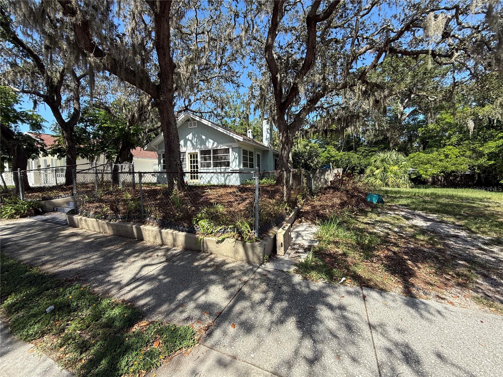 A rare opportunity to own this quaint cottage in the heart of Tarpon Springs. This is a great opportunity for ABNB or fix and flip to to make it one of your own. Home is in a great area with no restrictions, so it's for you to do it up the way you want weather renting or fix and sell it. Home does have 3 mini/split energy efficient ductless A/C units, upgraded 200amp electrical system, upgraded plumbing, and a brick wood burning fireplace, and the roof was done in 2016. Located just a short walk from Whitcomb bayou and less than 10 minutes from the beaches, Downtown Tarpon Springs, or the historic Sponge Docks. This extremely desirable location is close to downtown & everything that makes Tarpon Springs the place to be; wonderful restaurants, quaint shops, galleries, art festivals. ***NO FLOOD***insuracne great elevation never had water on the property. Make an offer!