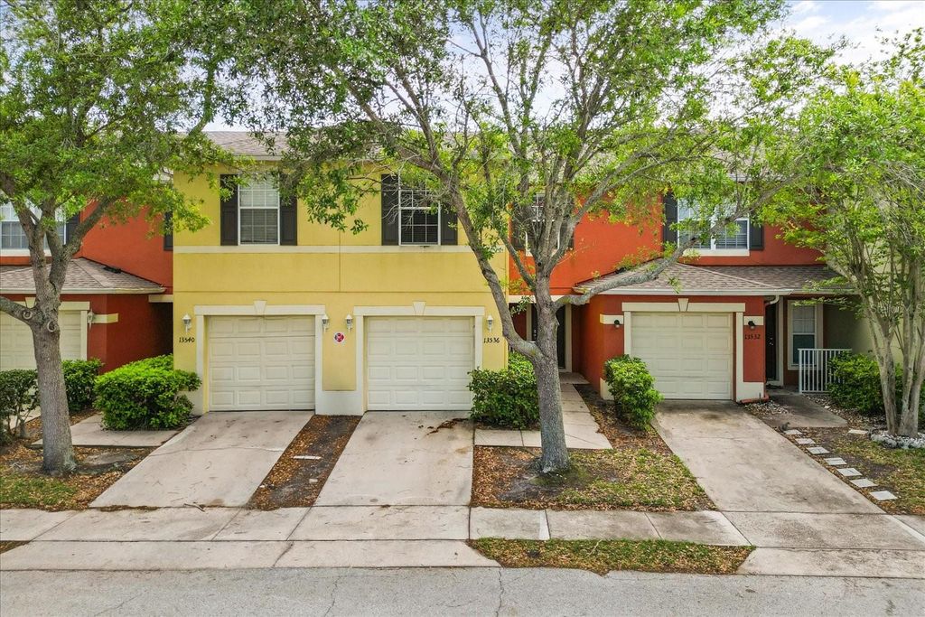 Photo of 13536 Tea Rose Way #119, Orlando, FL 32824 (MLS # O6395383)