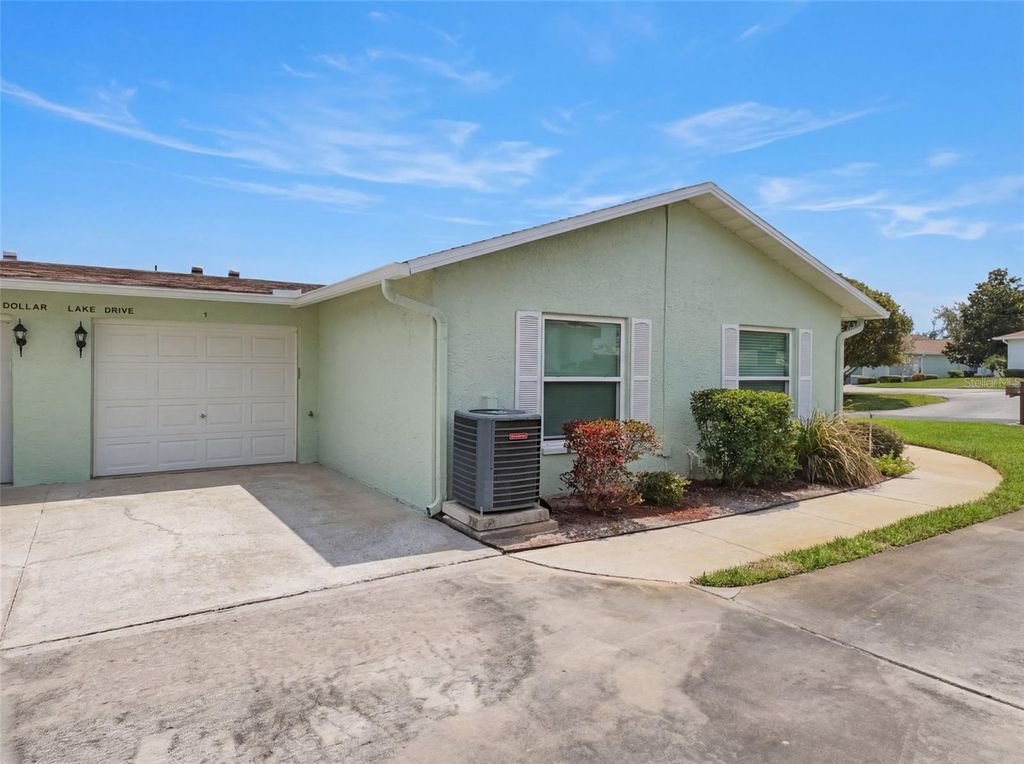 Photo of 11341 Dollar Lake Drive #1, Port Richey, FL 34668 (MLS # W7883575)