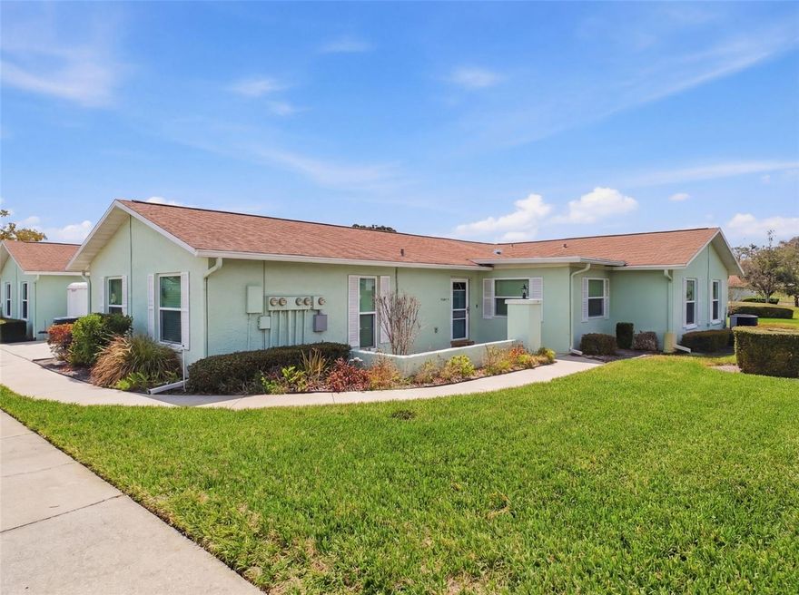 Tasteful move-in ready Condo in Beautiful Timber Oaks on Florida's west coast.  Unique 2 bedrooms home in "quad" building of 4 units designed with privacy in mind.  2 full bathrooms (one en-suite in primary bedroom), open kitchen.  Bonus room incorporated into living space adds lots of versatility.  Finished with durable laminate plank flooring and tile in wet areas, and every square inch is freshly painted inside.  It's rare to have covered parking in a community like this, but this home includes an attached garage with room for your vehicle plus storage!!  Outside, you have space for your landscaping projects, but the grounds are cared for by the association including lawn care, exterior pest spraying and more.  Exterior maintenance of building is included in the monthly fee, as is the water, sewer, trash, basic cable; plus access to the spectacular clubhouse and pool where there are many activities and events offered in the Timber Oaks!!