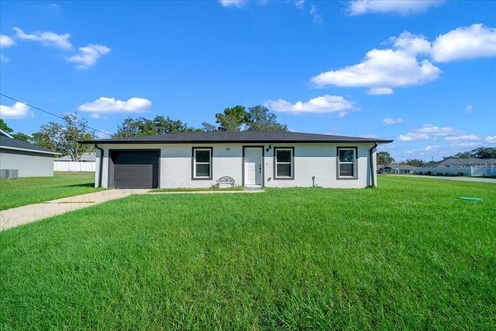 Photo of 83 Dogwood Circle, Ocala, FL 34472 (MLS # OM732976)