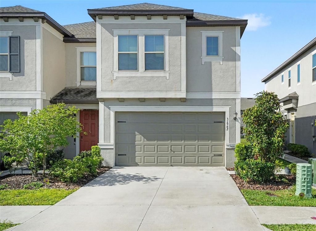 Photo of 31962 Blue Passing Loop, Wesley Chapel, FL 33545 (MLS # TB8494282)