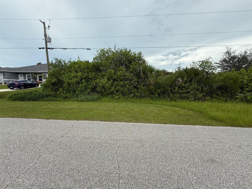 Photo of 7267 David Boulevard, Port Charlotte, FL 33981 (MLS # O6345693)