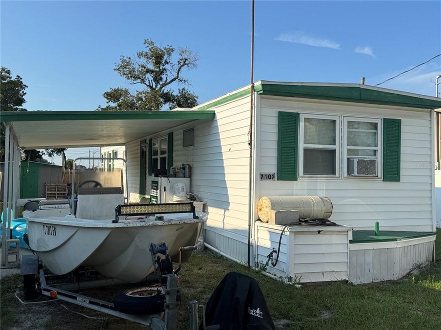 Discover this 2-bedroom, 2-bathroom mobile home situated on its own land in a quiet Hudson neighborhood. Located on a peaceful dead-end road, this fully fenced property offers privacy and plenty of space. The split floor plan provides comfortable living, while the carport adds convenience for parking.
Sitting on a large lot with well and septic, the yard offers endless potential — perfect for storing recreational vehicles, boats, or creating your own outdoor retreat. The home does need some TLC, but it’s an excellent opportunity for investors seeking a rental property or buyers ready to make it their own residence.
No HOA and no 55+ restrictions give you freedom and flexibility. Conveniently located near State Road 52, you’ll be just minutes from restaurants, shopping, and everyday amenities.