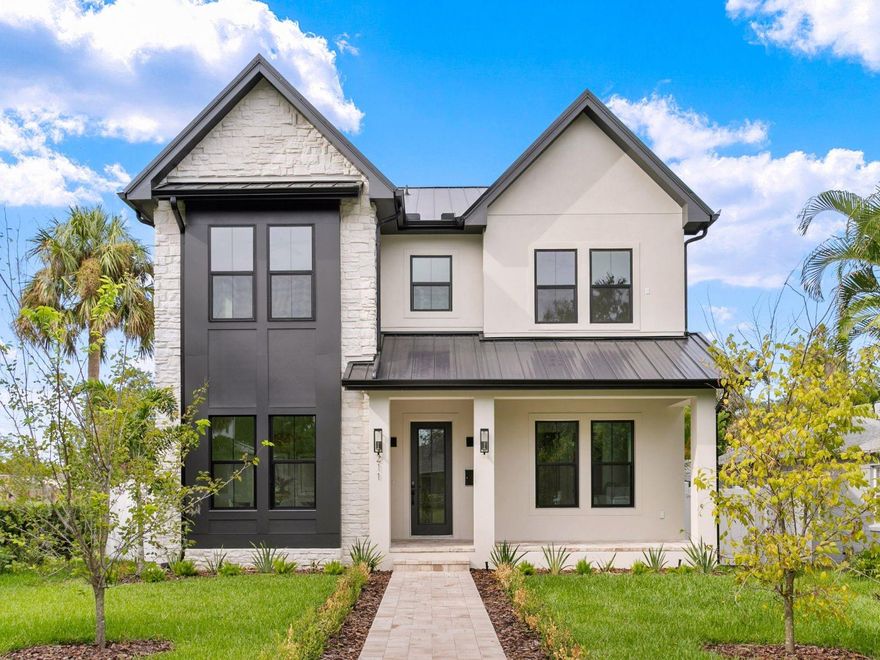 Under Construction. Construction is complete! No Flood Insurance Required.Welcome to this stunning new construction home by Bay to Bay Group, where timeless American Vernacular architecture blends seamlessly with modern transitional elegance. Nestled in Old Northeast, one of St. Petersburg’s most sought after neighborhoods, this five bedroom, four and a half bath residence with a detached two car garage is thoughtfully designed for both luxurious living and effortless entertaining.
Inside the main home, you’ll find four spacious bedrooms (three upstairs and one on the main level), an office or den, a versatile upstairs bonus room, and three and a half bathrooms. Elevated finishes including engineered hardwood flooring, soaring ceilings, solid core doors, custom railings, natural gas appliances, and designer selections create an atmosphere of warmth and sophistication throughout.
The chef’s kitchen is a true centerpiece, boasting Taj Mahal Quartzite countertops, paneled appliances, premium Z Line appliances, a natural gas range, abundant storage, and a walk in pantry. It flows seamlessly into the expansive living room with a gas fireplace, offering the perfect setting for gatherings or quiet evenings at home.
Step outside to your private backyard retreat, complete with a heated swimming pool and spa (gas powered), limestone pavers, custom railings, French drain system, and a fully equipped outdoor kitchen featuring a built in grill, ideal for year round entertaining and al fresco dining.
Above the detached two car garage, a fully permitted Accessory Dwelling Unit (ADU) offers an additional bedroom and bathroom. Perfect for guests, a private office, or rental income, the ADU provides exceptional versatility and added value.
This solidly built home features block construction on the first level, hurricane impact windows and doors, and a durable metal roof. It is outside the flood zone and includes a Builder’s 2 10 Warranty for peace of mind.
Enjoy unparalleled convenience with easy access to Coffee Pot Riviera, boat ramps, scenic parks, and everyday essentials like Whole Foods, Trader Joe’s, Fresh Market, and Publix. Just minutes from vibrant downtown St. Pete, you’ll find waterfront parks, world class dining, museums, and cultural events. Albert Whitted Airport is nearby, and Tampa International Airport is only a 25 to 30 minute drive.