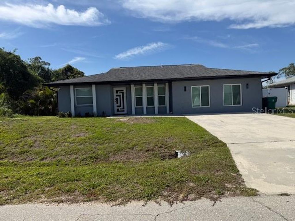 Photo of 1249 Joplin Avenue NW, Port Charlotte, FL 33948 (MLS # C7524866)