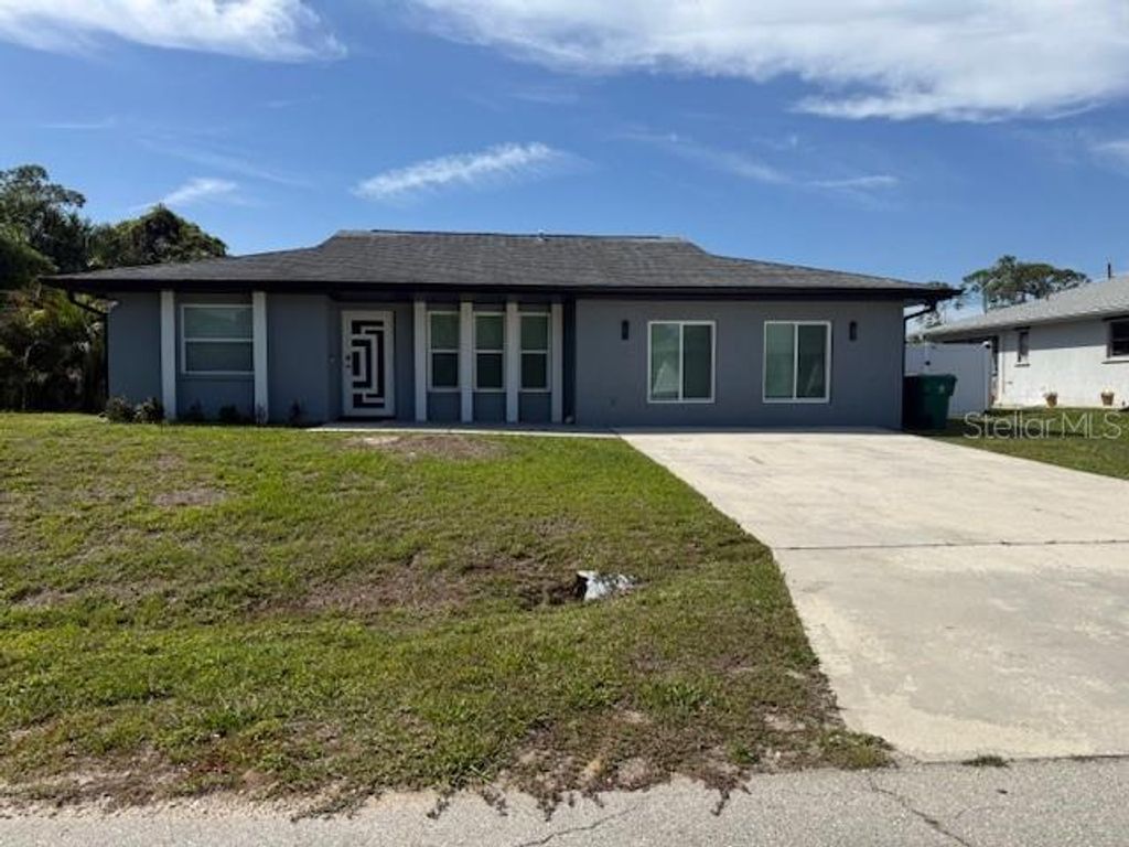 Photo of 1249 Joplin Avenue NW, Port Charlotte, FL 33948 (MLS # C7524866)
