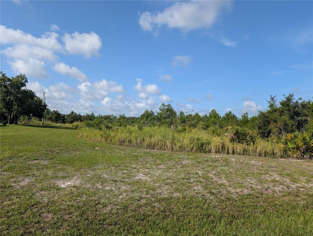 Photo of 7 Poinciana Drive, Indian Lake Estates, FL 33855 (MLS # P4939112)