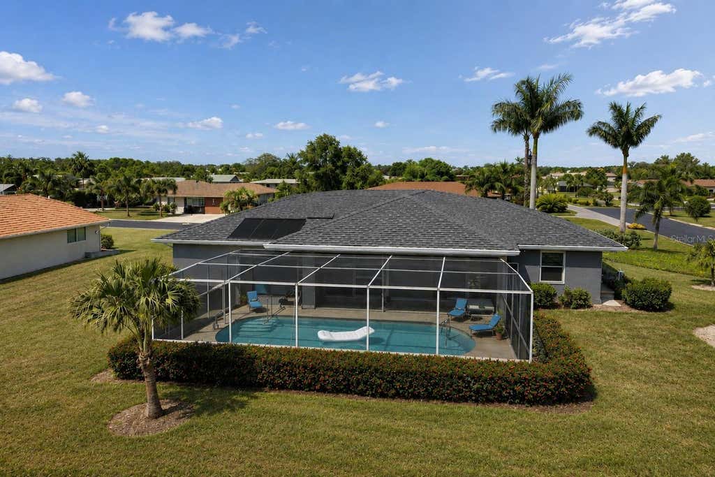 Photo of 1840 Flametree Lane, Venice, FL 34293 (MLS # O6435114)