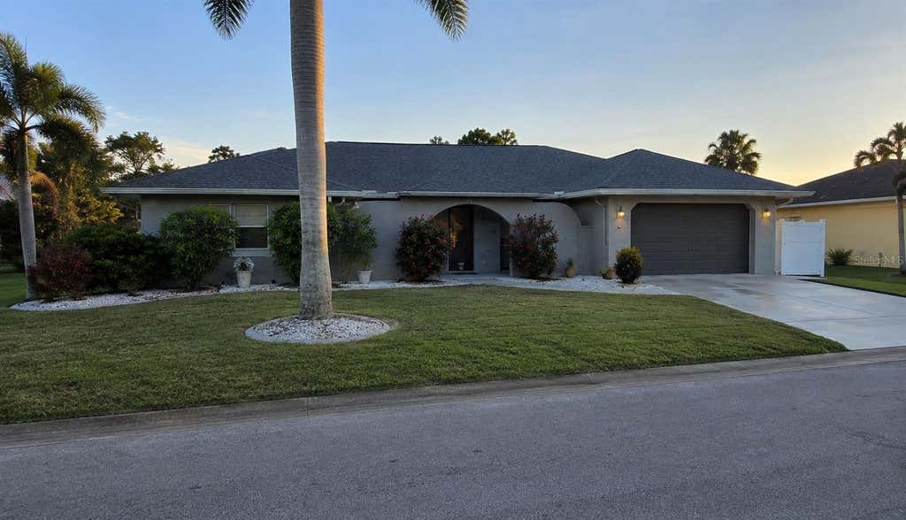 Photo of 1840 Flametree Lane, Venice, FL 34293 (MLS # O6435114)