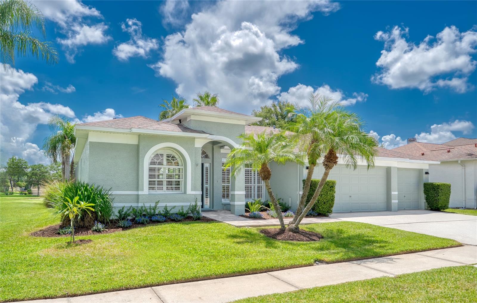 Stunning, Move-In Ready Pool Home on the Golf Course in The Eagles!
Welcome to your updated four-bedroom, three-bathroom pool home, ideally situated on a quiet cul-de-sac near the front of the guard-gated Eagles Golf Community & Zoned for all A-rated schools!
With 2,202 square feet of light-filled living space and breathtaking views overlooking the fifth hole of The Forest Course, this home offers the perfect balance of elegance, privacy, and modern comfort.
From the moment you arrive, you’ll appreciate the fresh exterior paint (July 2025), lush landscaping, and updated lighting that all contribute to this home’s exceptional curb appeal.
Inside, you’ll find a warm and inviting atmosphere, enhanced by plantation shutters, crown molding, detailed trim work, and stylish, spill-proof engineered wood flooring. The formal living and dining rooms flow seamlessly into the open kitchen and breakfast nook, creating an ideal setting for entertaining or enjoying everyday life.
The kitchen features granite countertops, stainless steel appliances, upgraded cabinetry, a flat-top stove, and a reverse osmosis water filtration system. It overlooks a spacious family room with a cozy fireplace, custom built-in entertainment center, and large sliding glass doors that lead out to the pool—blurring the lines between indoor and outdoor living.
Step outside and you’ll find your own private oasis. The pool has been resurfaced with PebbleTec (2017), and the heated spa and upgraded paver patio are all enclosed within a screened lanai. The view beyond reveals an uninterrupted stretch of fairway and water—serene and perfect for enjoying Florida’s sunshine and peaceful wildlife.
The primary suite is a true retreat, offering direct access to the pool and a spa-like ensuite bathroom complete with a walk-in shower, garden tub, dual vanities with new sinks and faucets, upgraded tile flooring, and a built-in makeup vanity. A thoughtful split-bedroom layout provides privacy for guests or family, with three additional bedrooms and two full guest baths—one finished in timeless travertine and the other with direct pool access.
This home also features fresh interior paint (2025), new lighting fixtures inside and out, new ceiling fans throughout, a recently replaced garage door opener, and the roof was replaced in 2016.
From your own backyard, enjoy daily sightings of deer, rare birds, and other native wildlife, all while living in a community that offers 24/7 gated security, two championship golf courses with no membership required, a newly remodeled clubhouse and restaurant with amazing NY Style pizza, and facilities for tennis, basketball, and pickleball.
This home is also ideally located near excellent shopping, dining, Tampa International Airport, and some of Florida’s most beautiful Gulf Coast beaches.
Move-in ready, freshly updated, and positioned on one of the most desirable lots in The Eagles, this home is must-see. Schedule your private showing today.